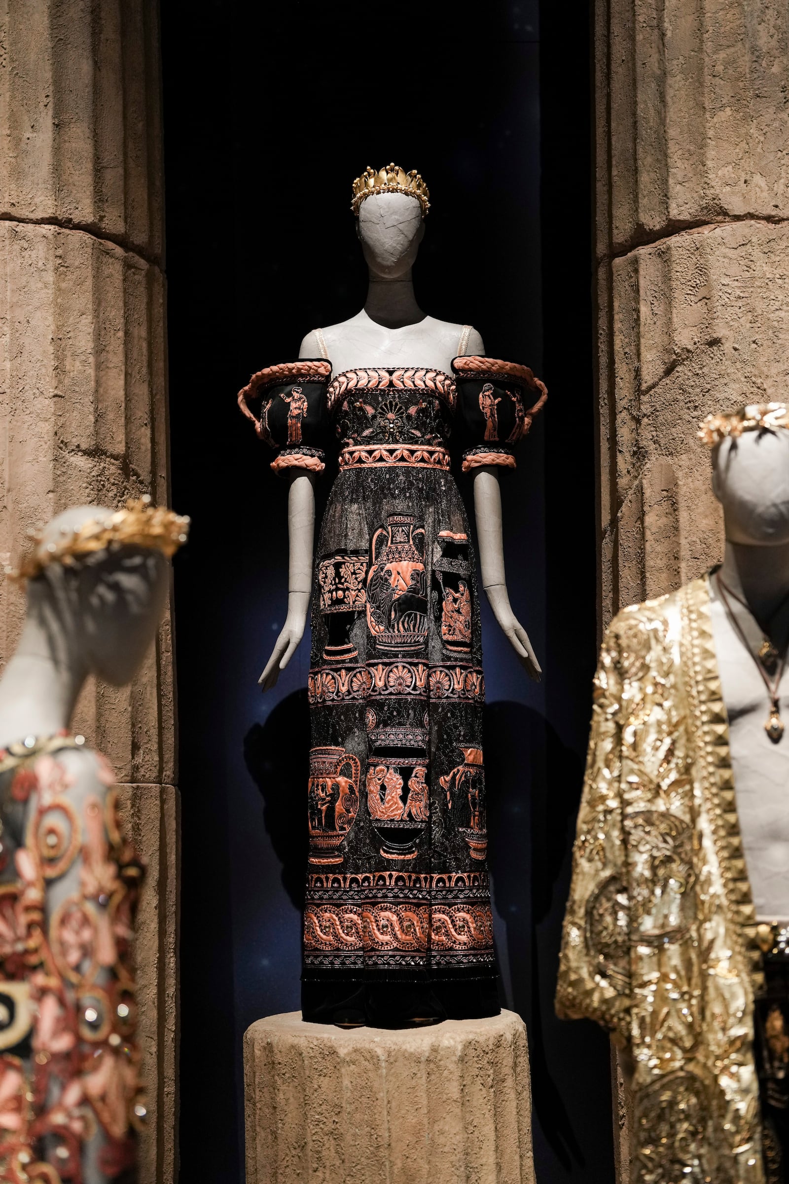 Creations are displayed during the exhibition "From the Heart to the Hands: Dolce&Gabbana" at the Grand Palais, in Paris, Thursday, Jan. 9, 2025. (AP Photo/Thibault Camus)