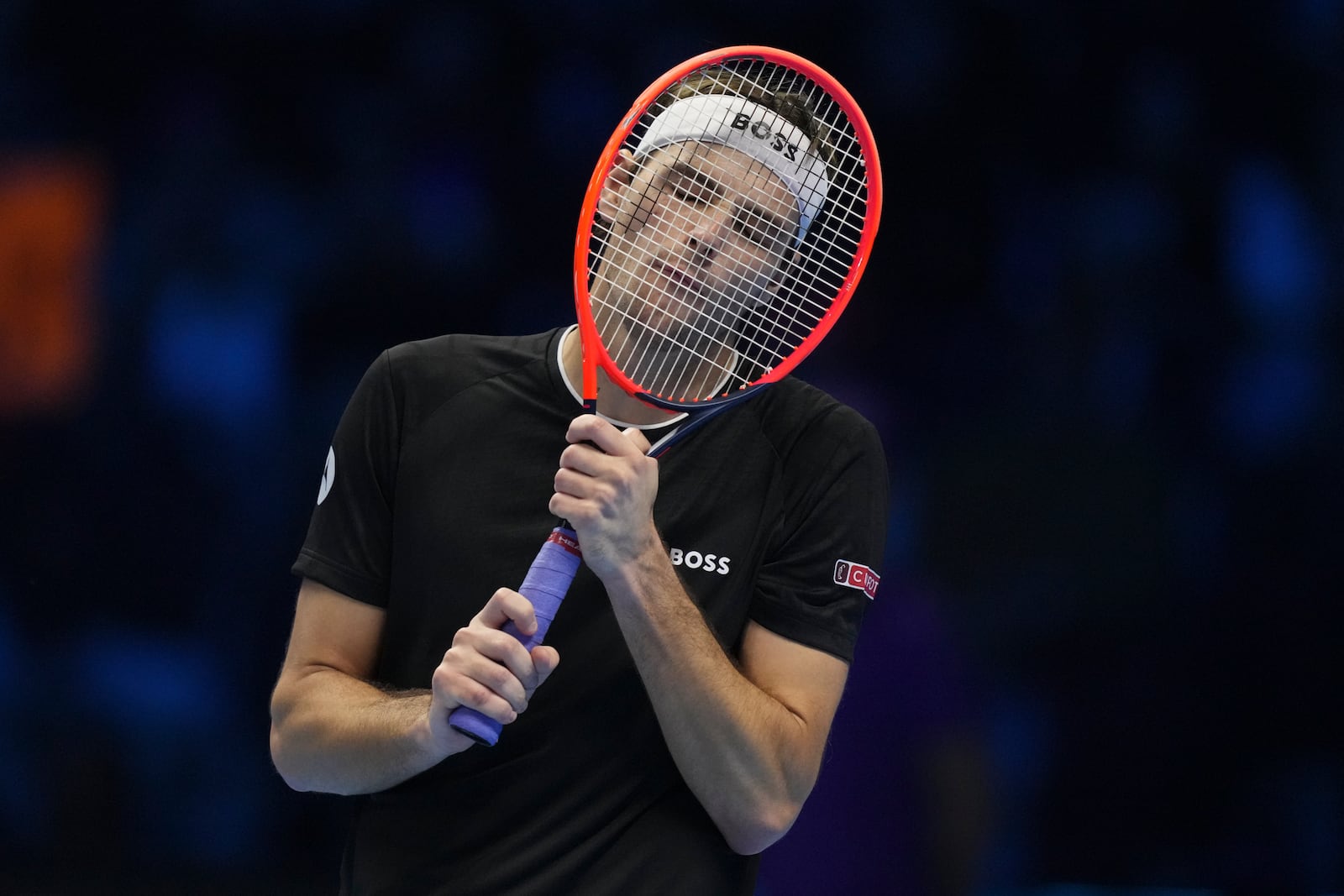 Taylor Fritz of the United States reacts during the final match of the ATP World Tour Finals against Italy's Jannik Sinner at the Inalpi Arena, in Turin, Italy, Sunday, Nov. 17, 2024. (AP Photo/Antonio Calanni)