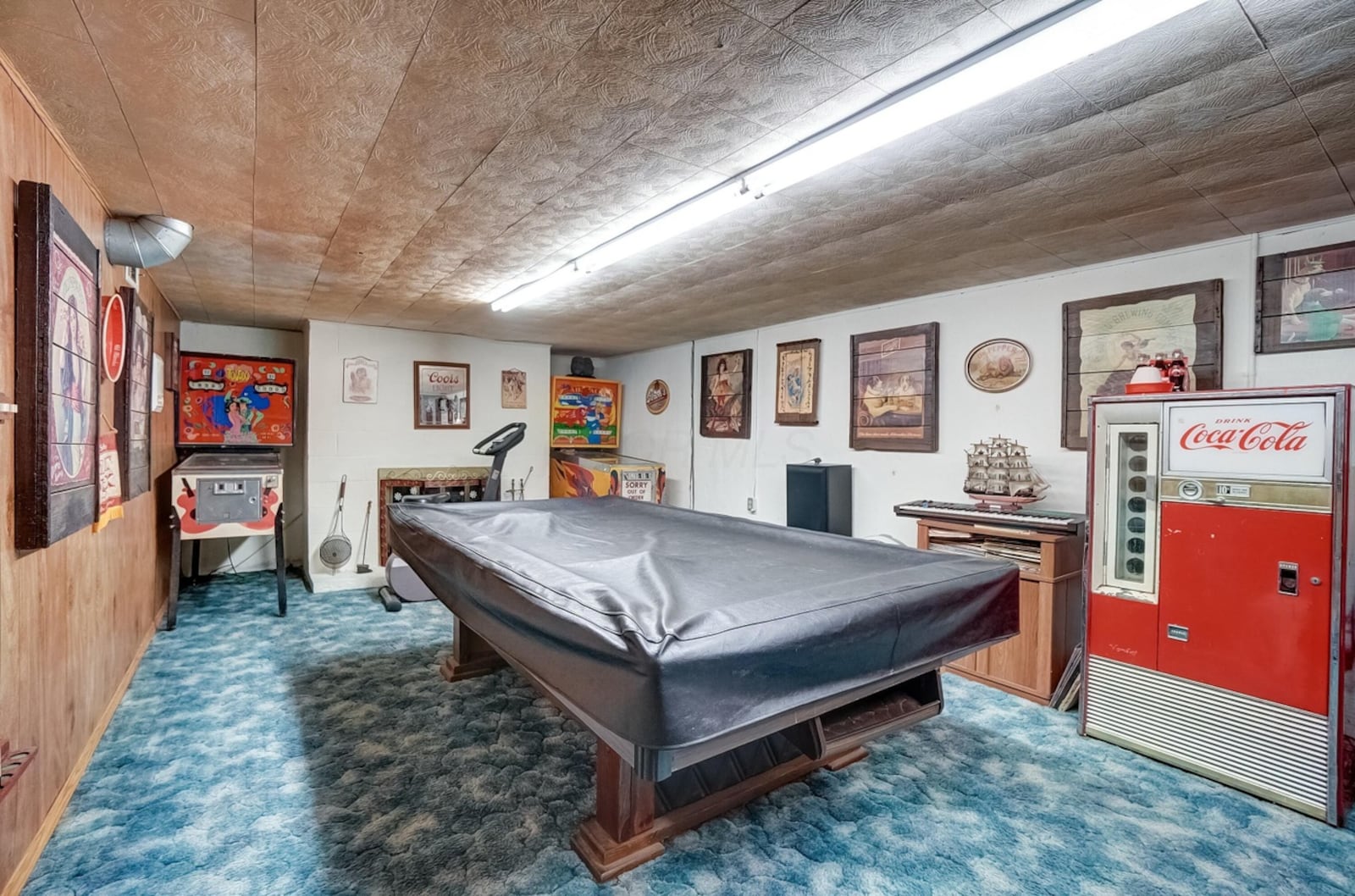 The lowest level has a billiard room with an additional fireplace and carpeting.