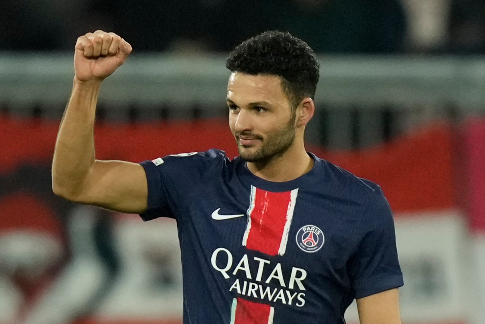 PSG's Goncalo Ramos celebrates after scoring the opening goal against FC Salzburg during a Champions League opening phase soccer match in Salzburg, Austria, Tuesday, Dec. 10, 2024.(AP Photo/Matthias Schrader)