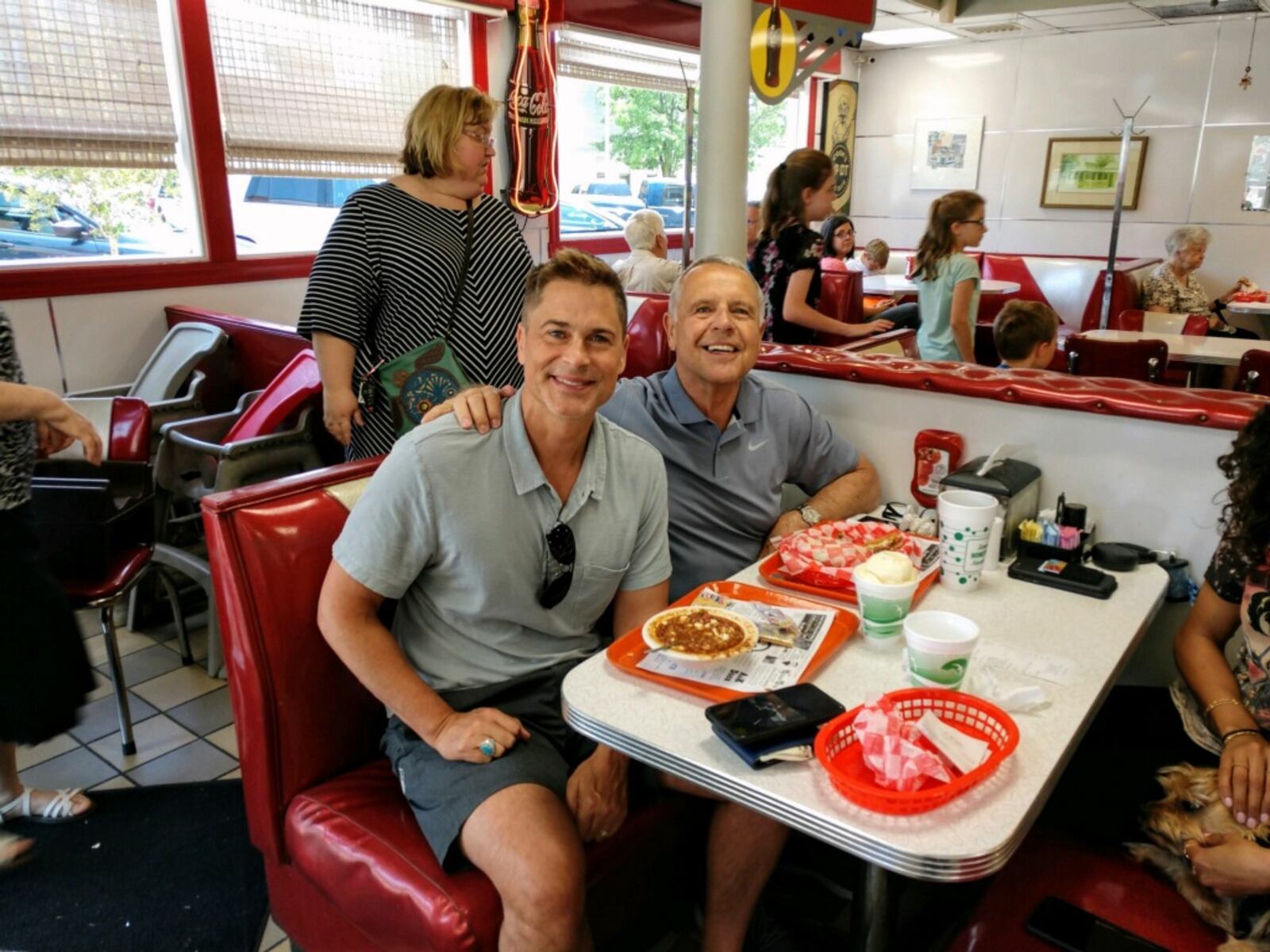 Rob Lowe and his dad eat a lunch of burgers and pie at The Spot in Sidney on Friday, May 31.