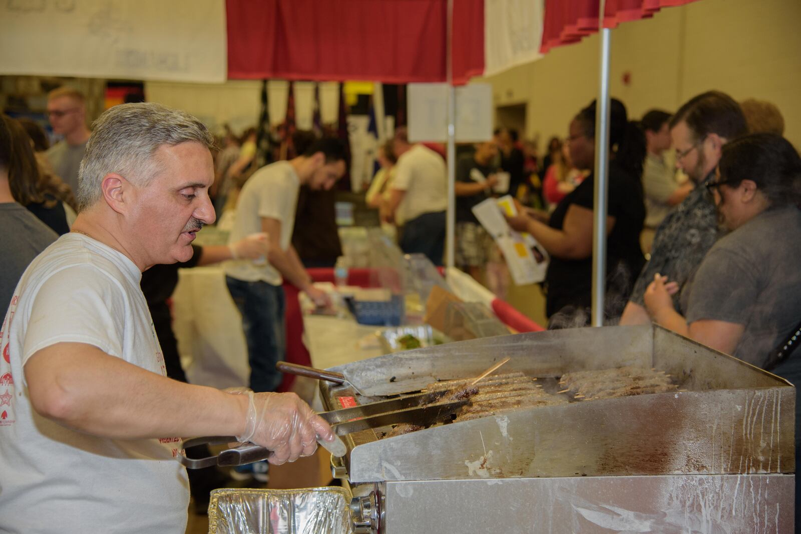 The 45th year for ‘A World A’Fair’, organized by the Dayton International Festival, Inc., took place at the Dayton Convention Center on May 18th, 19th and 20th. This year, a total of 34 countries and ethnicities took part in the  the “largest international festival in Ohio," either by making authentic cultural cuisine, performing on stage or presenting their own heritage in a colorful and authentic way. PHOTO / TOM GILLIAM PHOTOGRAPHY