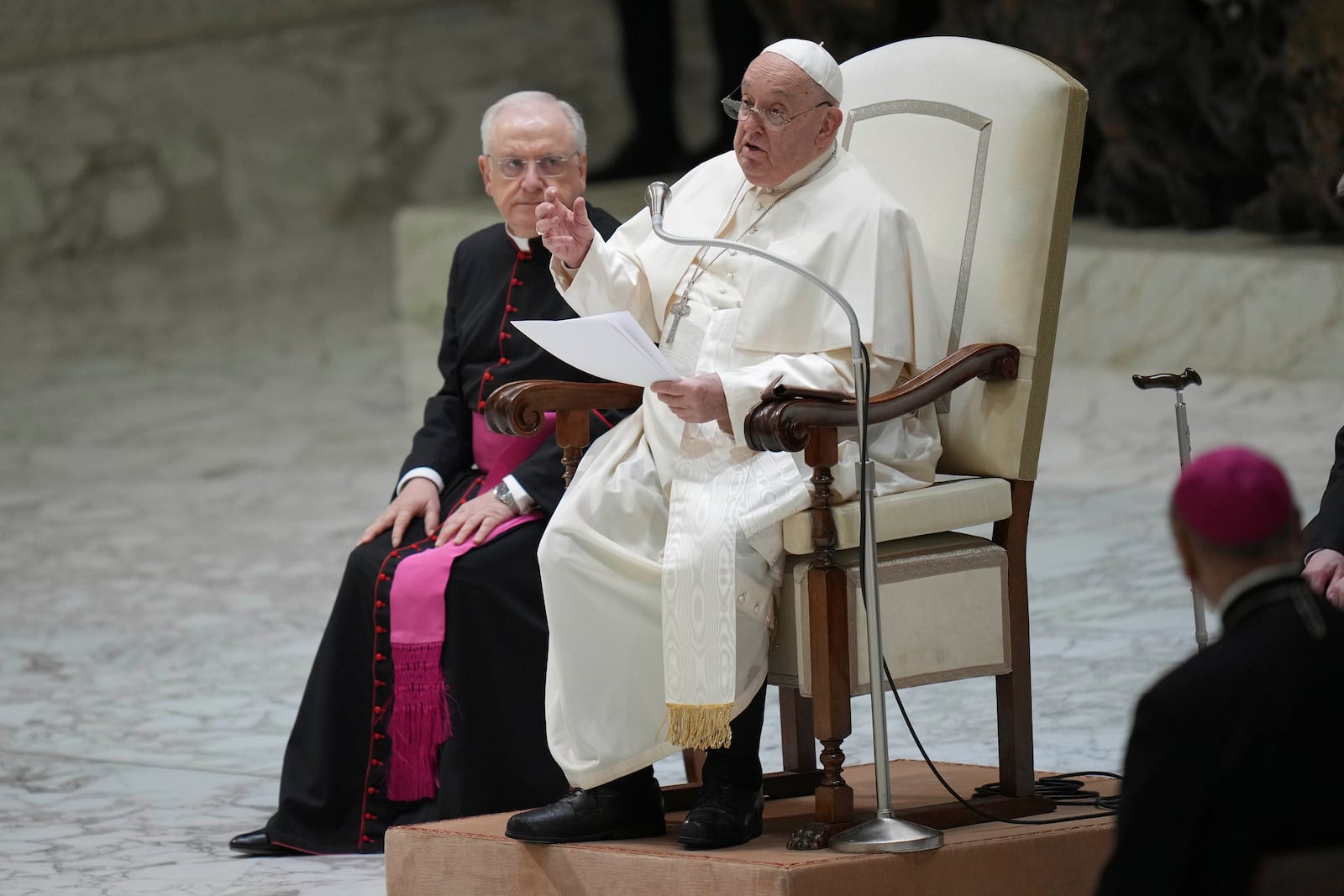 Pope Francis talks during an audience with Catholic associations of teachers and students' parents in the Paul VI Hall, at the Vatican, Saturday, Jan. 4, 2025. (AP Photo/Alessandra Tarantino)