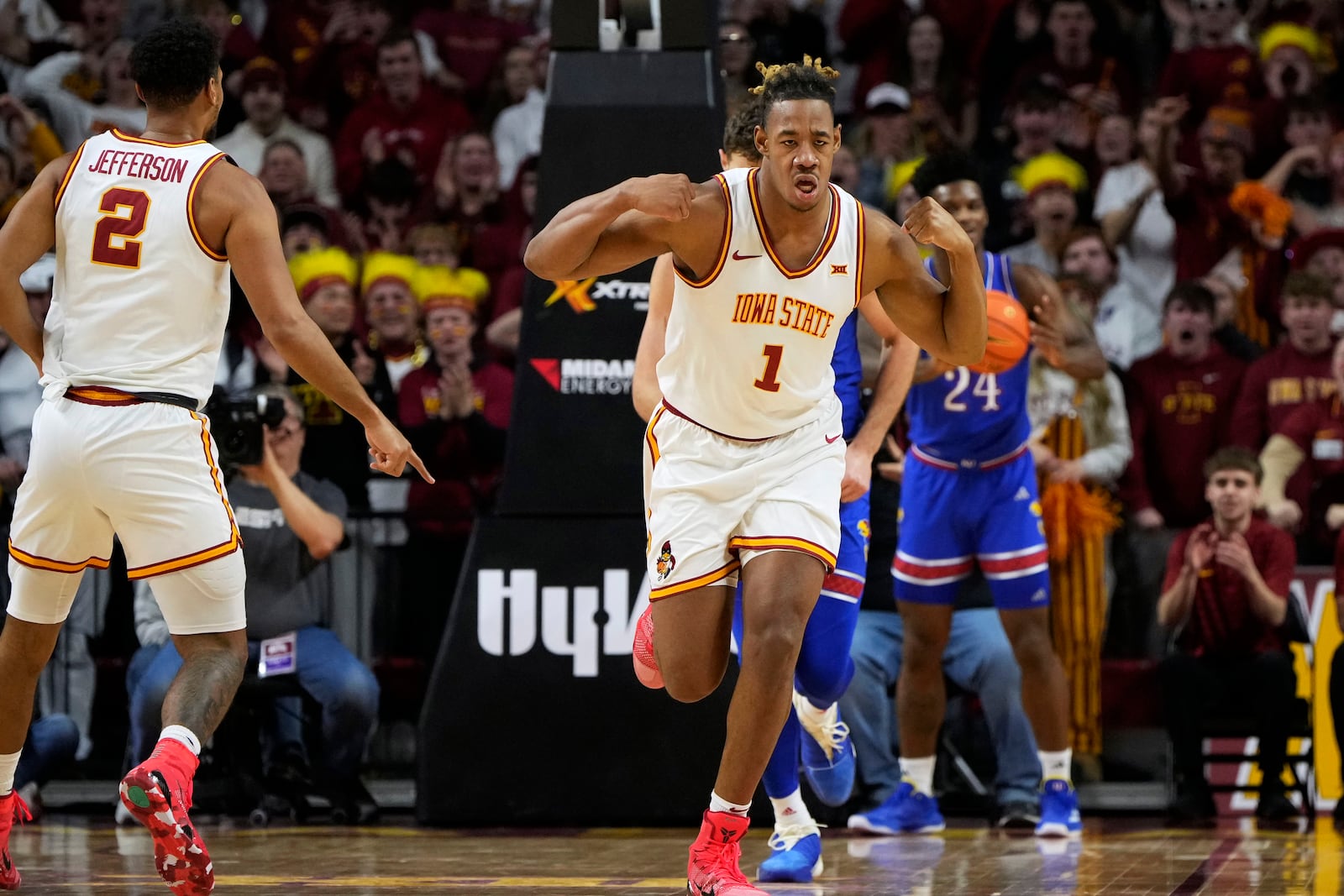 Iowa State center Dishon Jackson (1) reacts after making a basket during the first half of an NCAA college basketball game against Kansas, Wednesday, Jan. 15, 2025, in Ames, Iowa. (AP Photo/Charlie Neibergall)