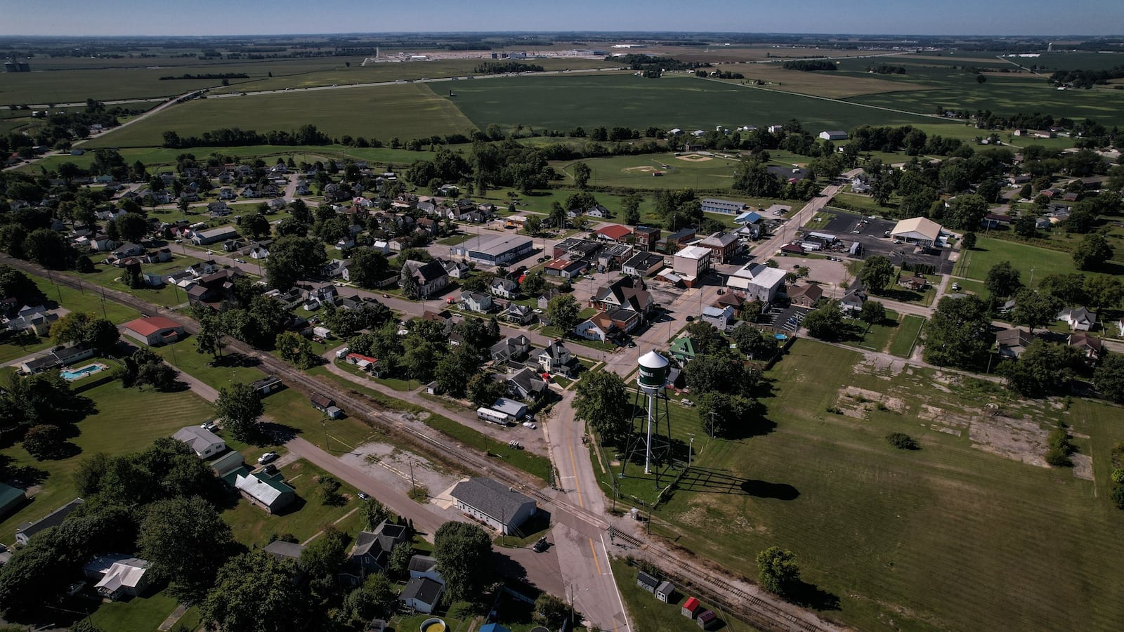 The town of Jeffersonville, population a little over 1,000, is the closest town to the, under construction, Honda and LG EV battery plant in the background. JIM NOELKER/STAFF