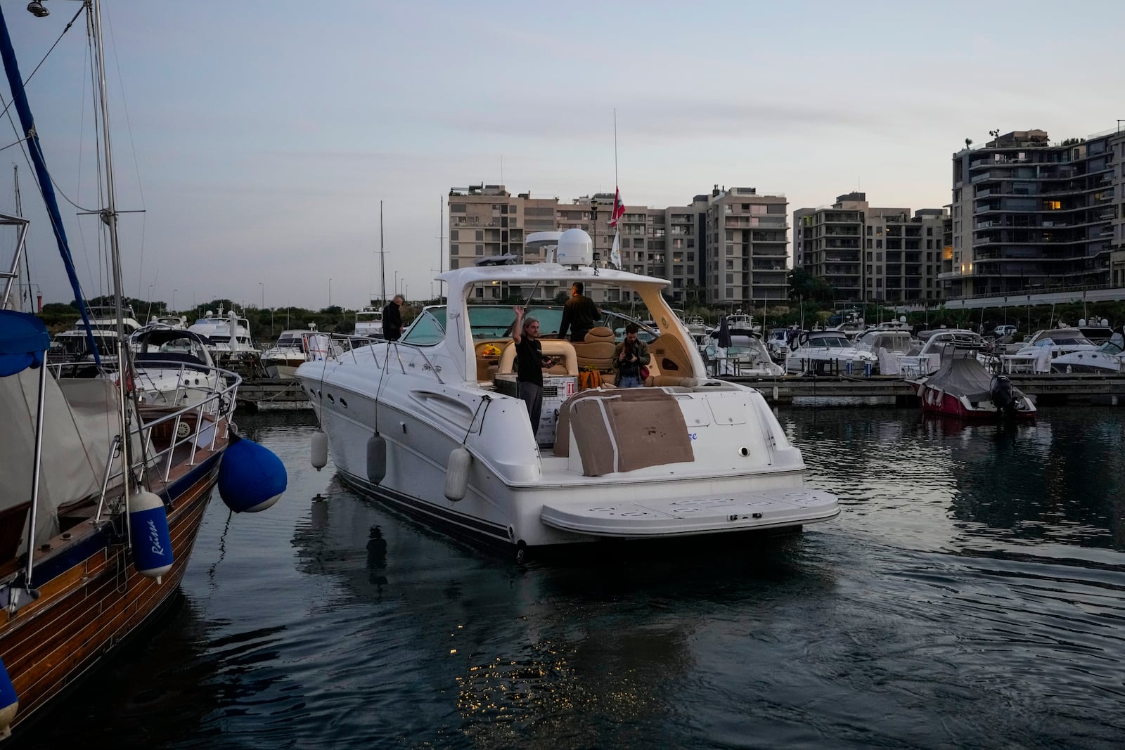 A yacht carrying Sara the lion cub leaves at the Dbayeh sea port, north of Beirut, Lebanon, Thursday, Nov. 14, 2024. (AP Photo/Hassan Ammar)