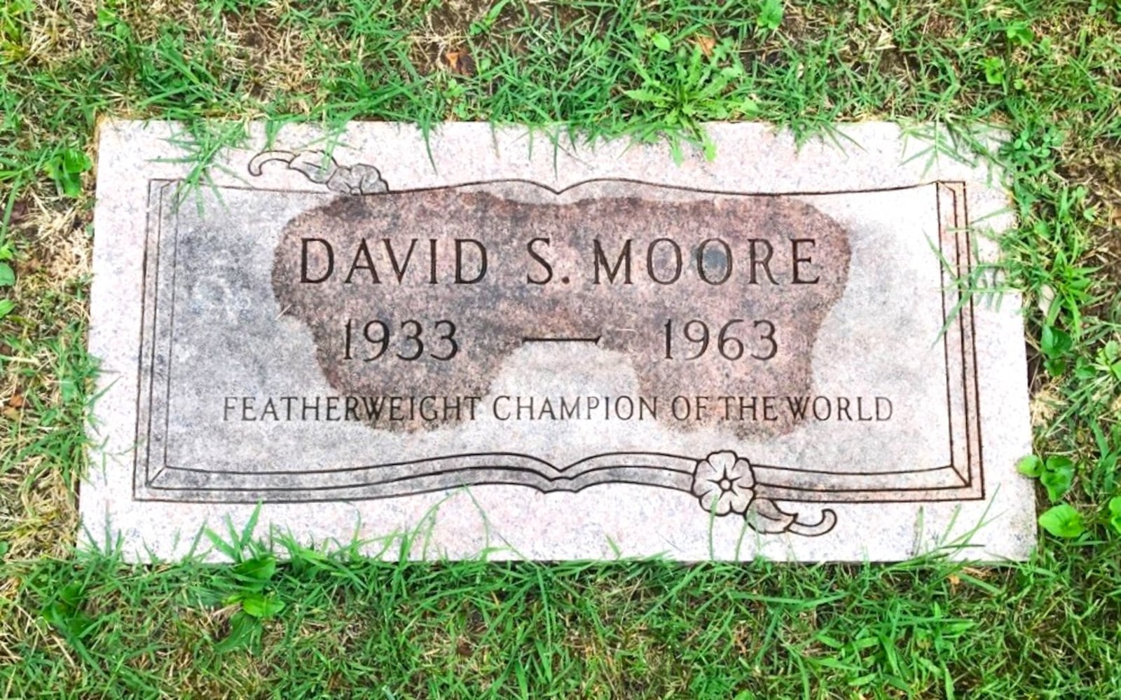 The gravestone of Davey Moore, the world featherweight champ from Springfield, who died from injuries sustained in his nationally televised world title fight with Ultiminio “Sugar” Ramos at Dodger Stadium in March of 1963. Over 10,000 people came to his funeral viewing in Los Angeles and another 10,000 passed his casket as he lay in rest in Springfield. Thousands followed his casket from the church to Ferncliff Cemetery for his burial. Tom Archdeacon/CONTRIBUTED