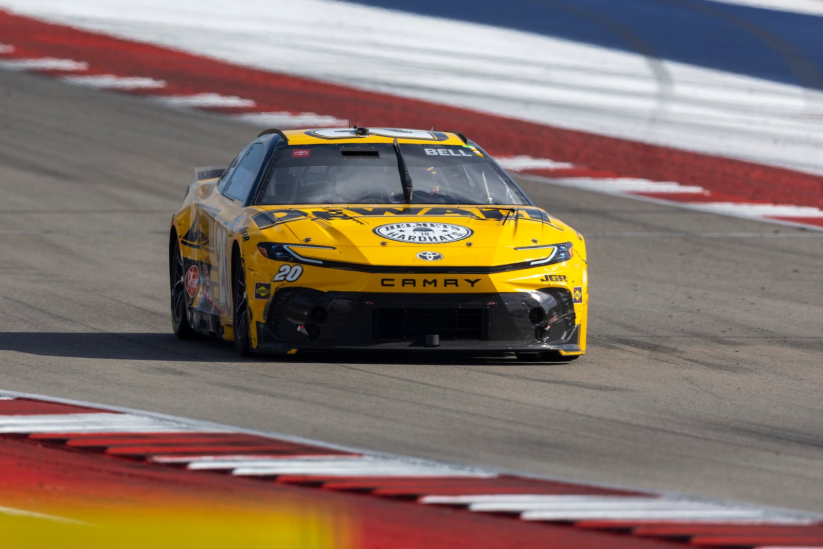 Christopher Bell pulls into Turn 19 during a NASCAR Cup Series auto race at Circuit of the Americas in Austin, Texas, Sunday, March 2, 2025. (AP Photo/Stephen Spillman)