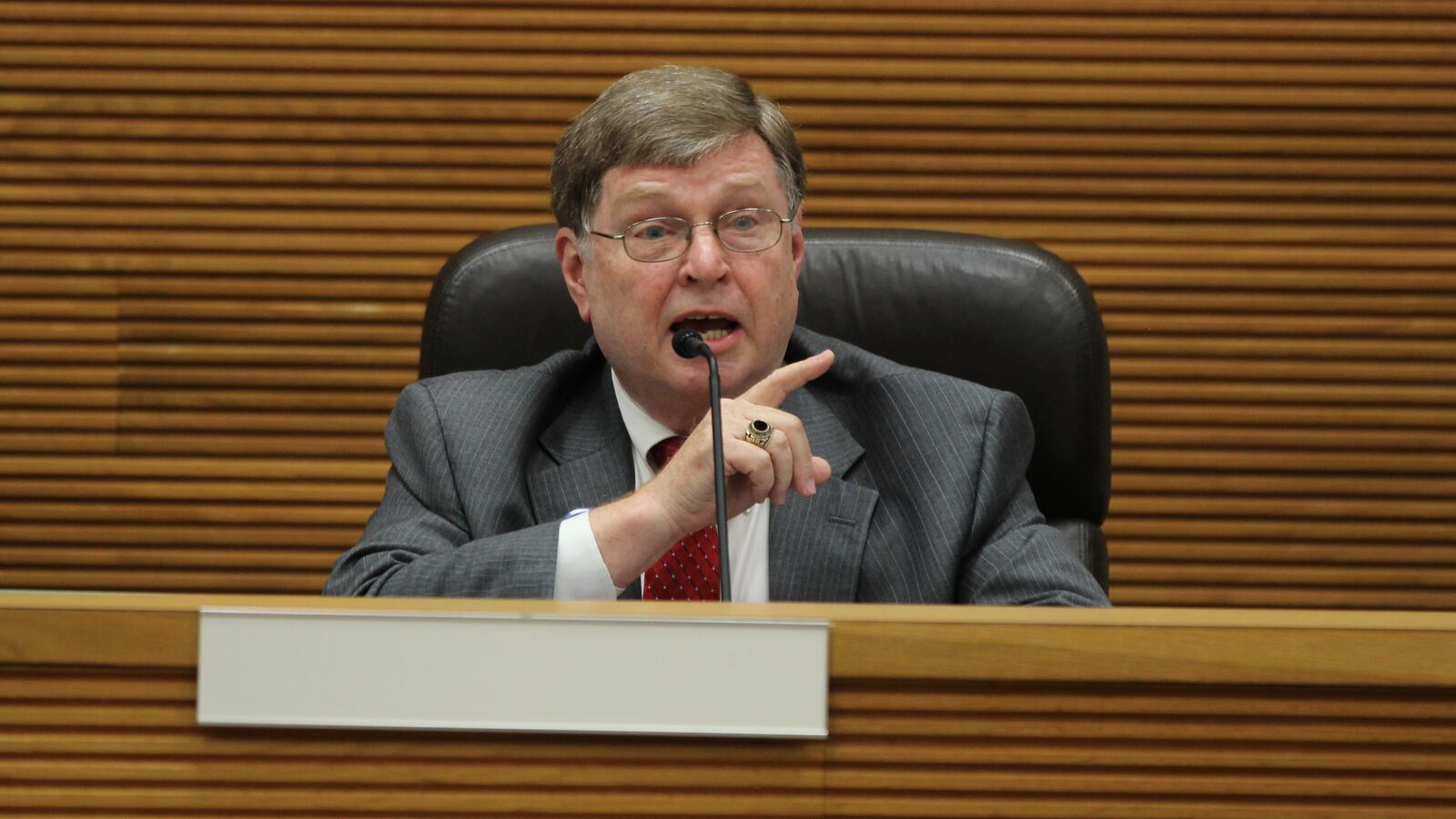 David Estrop speaks at the CONA candidates night at the City Hall forum last month. MICHAEL COOPER/STAFF