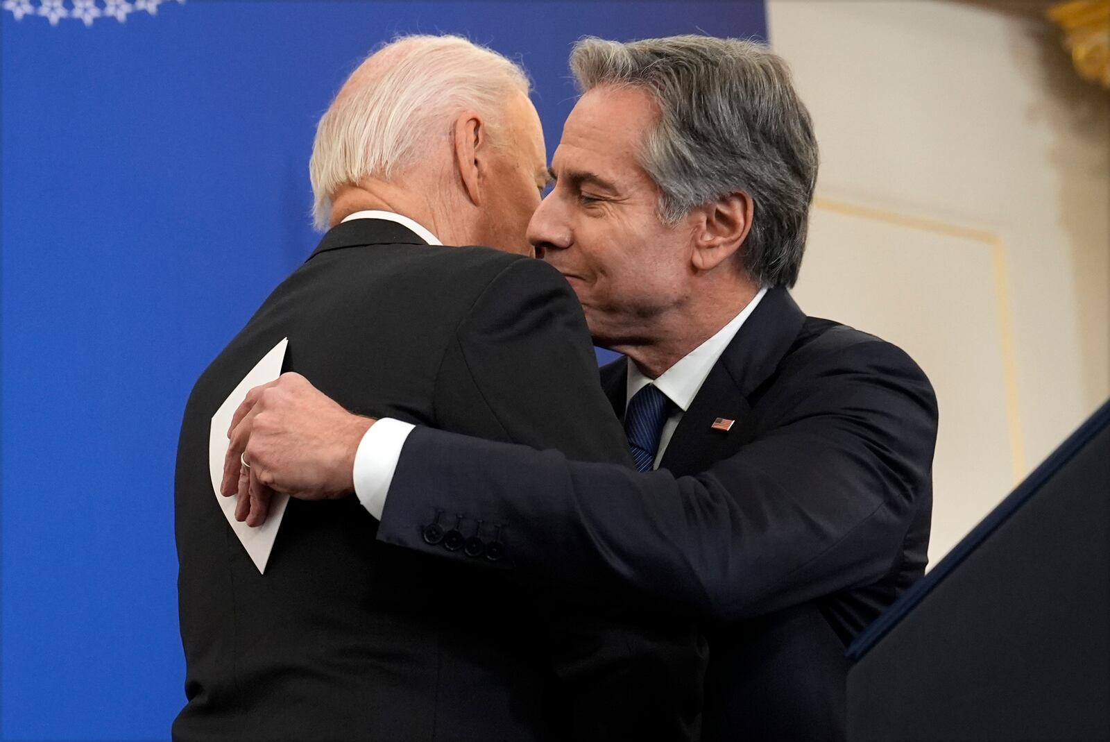 President Joe Biden hugs Secretary of State Antony Blinken before he speaks about foreign policy during a speech at the State Department in Washington, Monday, Jan. 13, 2025. (AP Photo/Susan Walsh)