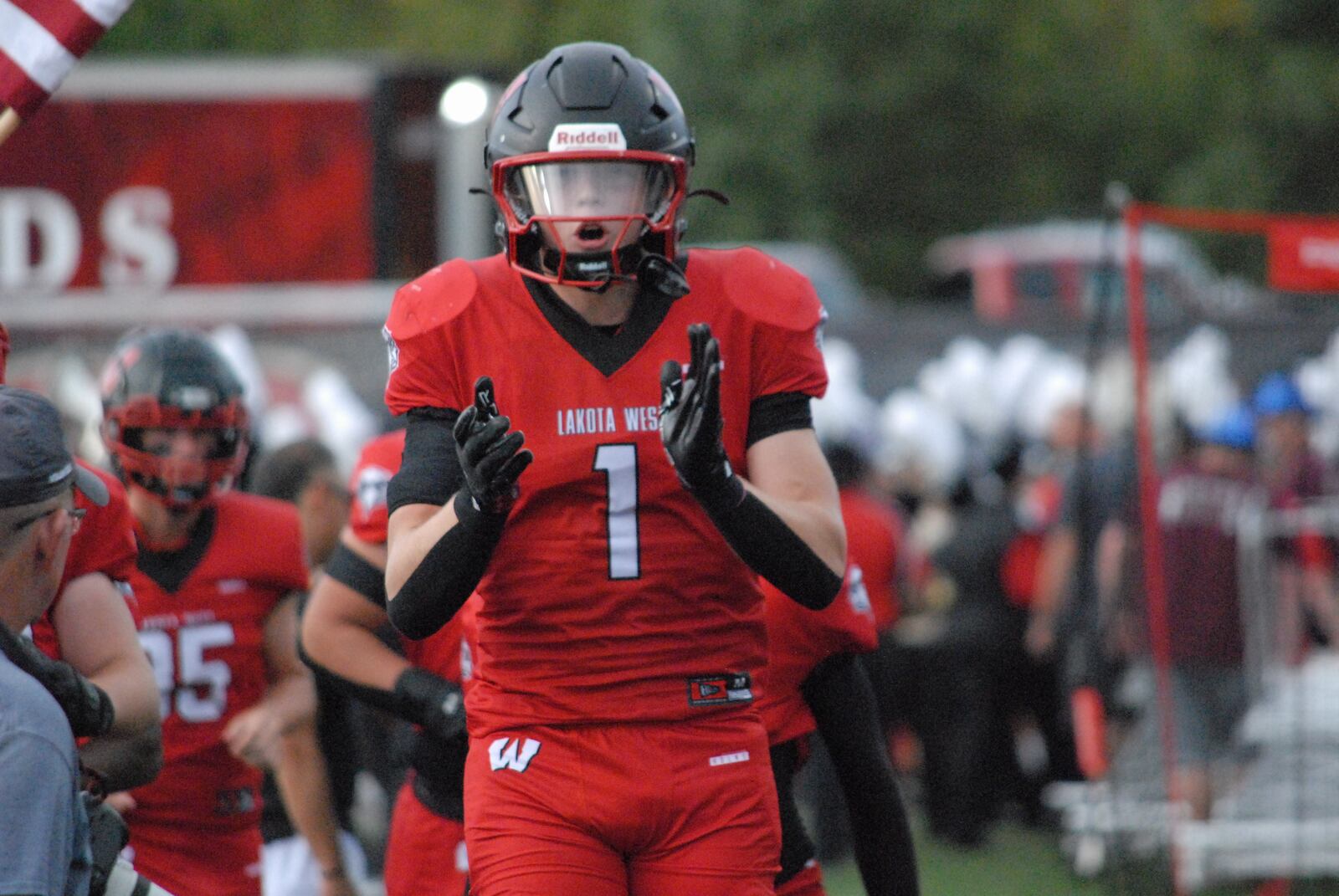 Lakota West's Grant Beerman (1) celebrates before taking the field against Fairfield on Friday night. Chris Vogt/CONTRIBUTED