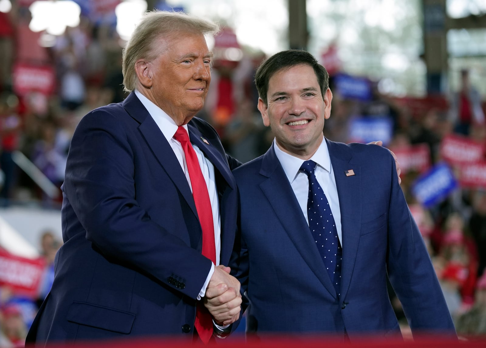 FILE - Republican presidential nominee former President Donald Trump greets Sen. Marco Rubio, R-Fla., during a campaign rally at J.S. Dorton Arena, Nov. 4, 2024, in Raleigh, N.C. (AP Photo/Evan Vucci, File)