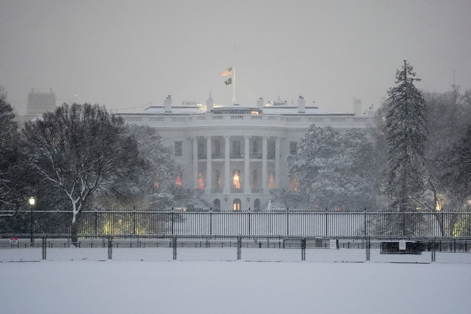 The White House is pictured during a winter snow storm in Washington, Monday, Jan. 6, 2025. (AP Photo/Matt Rourke)