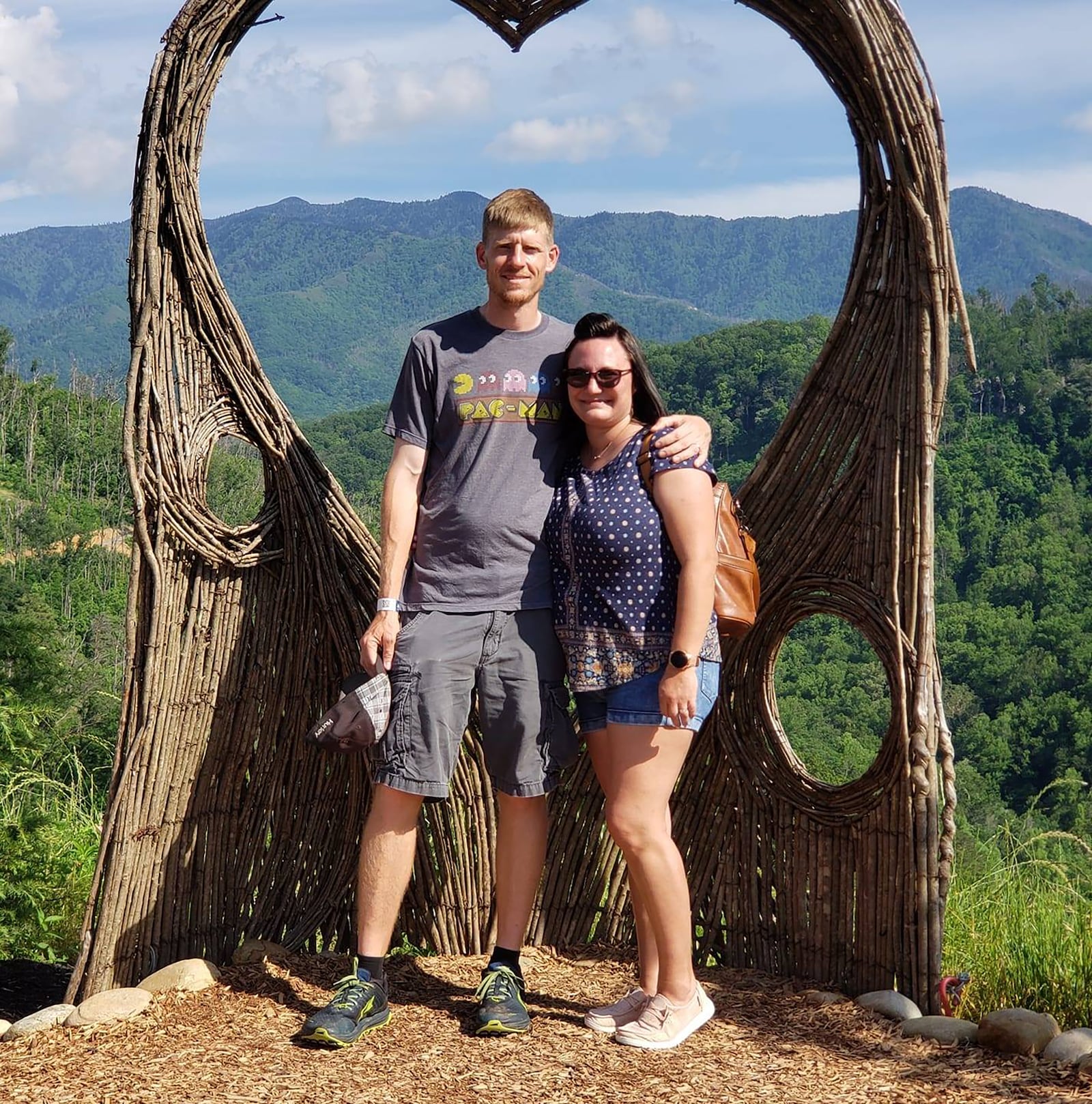 Carrie Graf (R) and her husband Perry. Perry helped take over care of the couple's three children while Carrie was recovering from breast cancer last year.