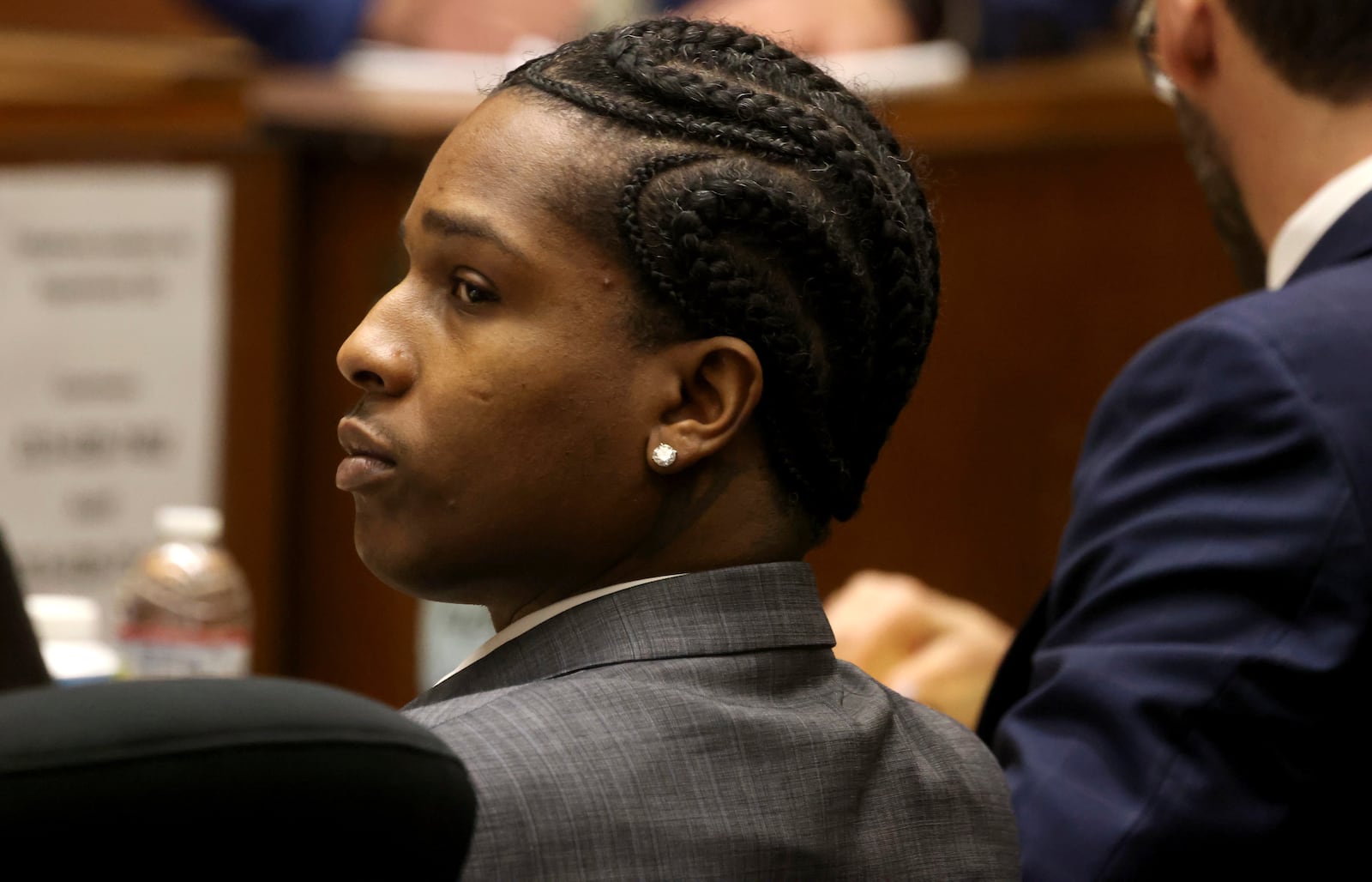 Rakim Mayers, aka A$AP Rocky, listens to opening remarks by the prosecuting attorney in his trial at the Clara Shortridge Foltz Criminal Justice Center in downtown Los Angeles, Friday, Jan. 24, 2025. (Genaro Molina/Los Angeles Times via AP, Pool)