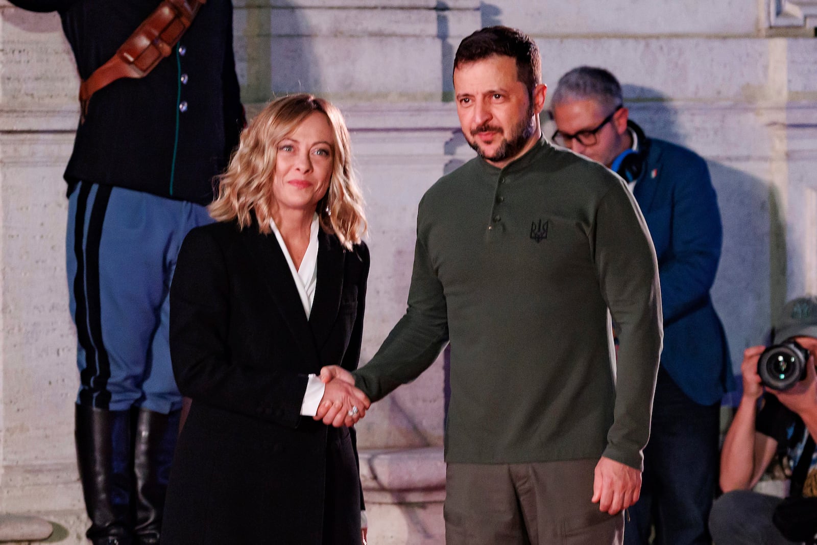 Italian Prime Minister Giorgia Meloni greets Ukrainian President Volodymyr Zelenskyy during a meeting at Rome's Villa Pamphilj, Wednesday, Oct. 10, 2024. (Roberto Monaldo/LaPresse via AP)