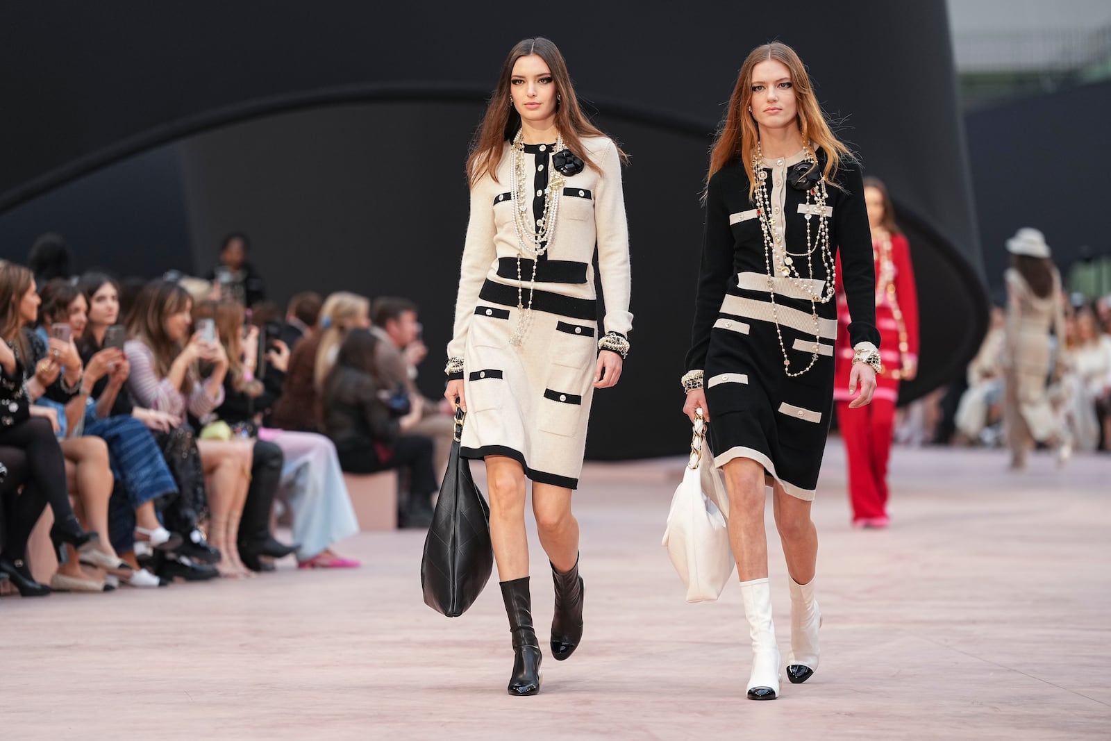 Models wear creations as part of the Chanel Fall/Winter 2025-2026 Womenswear collection presented Tuesday, March 11, 2025. in Paris. (Photo by Scott A Garfitt/Invision/AP)