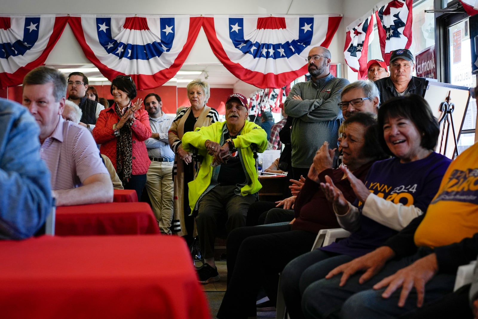 Supporters gather as Rep. Jim Jordan, R-Ohio, speaks at a rally for Rep. Michael Rulli, R-Ohio, at the Mahoning County Republican Party headquarters in Boardman, Ohio, Thursday, Oct. 17, 2024. (AP Photo/Carolyn Kaster)