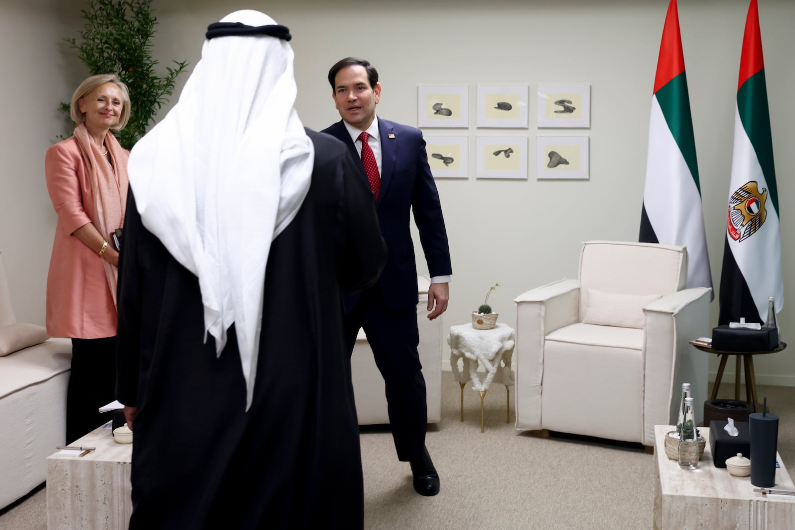 U.S. Secretary of State Marco Rubio, right, meets United Arab Emirates President Sheikh Mohamed bin Zayed Al Nahyan as they meet at ADNEC Centre Abu Dhabi in Abu Dhabi, United Arab Emirates, Wednesday, Feb. 19, 2025. (Evelyn Hockstein/Pool Photo via AP)