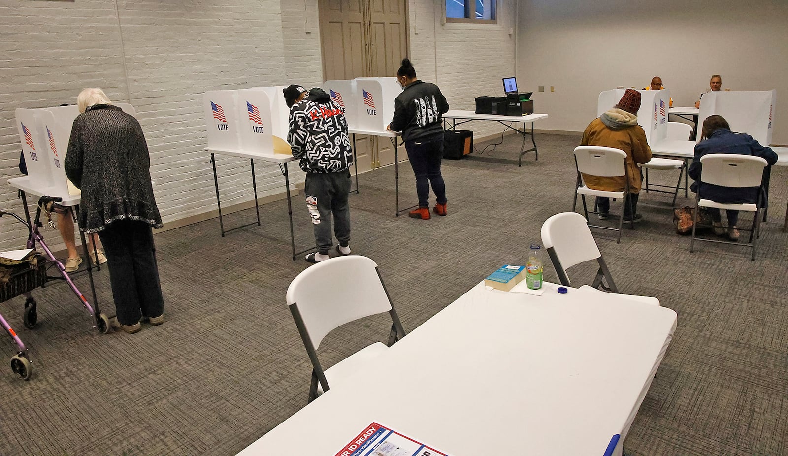 Voters wait to check-in Tuesday, Nov. 7, 2023 at the election poll in the Clark County Heritage Center.  BILL LACKEY/STAFF