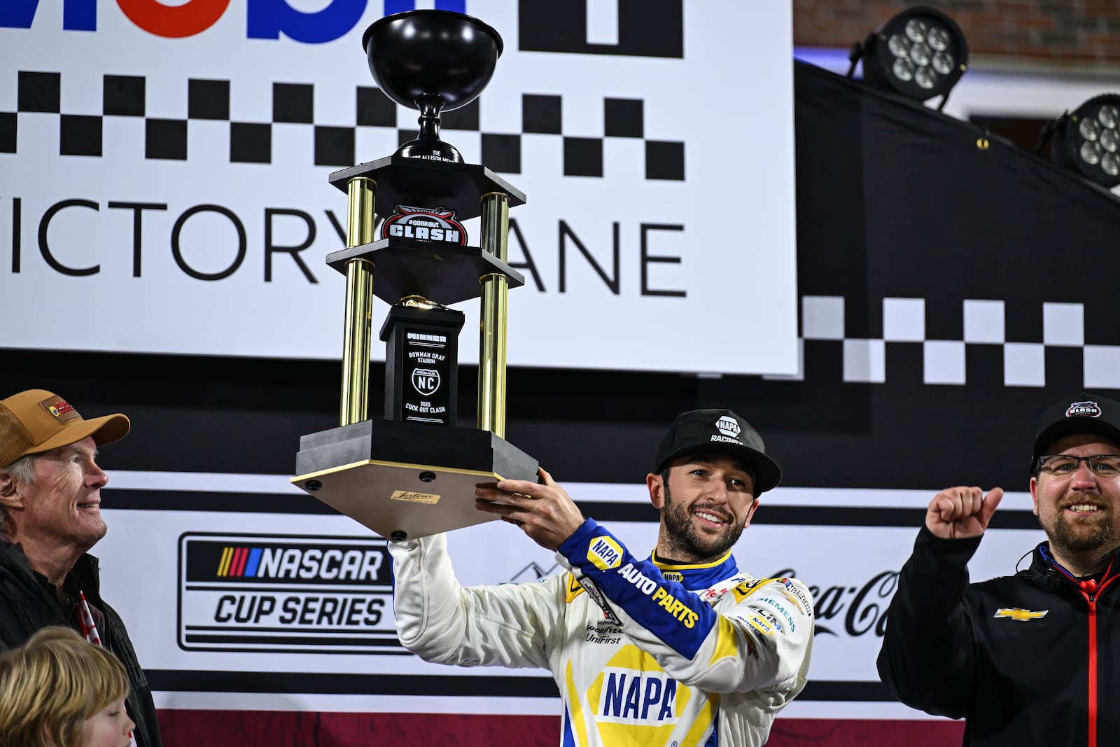 Chase Elliott, center, celebrates in Victory Lane after winning a NASCAR Cup Series auto race at Bowman Gray Stadium, Sunday, Feb. 2, 2025, in Winston-Salem, N.C. (AP Photo/Matt Kelley)