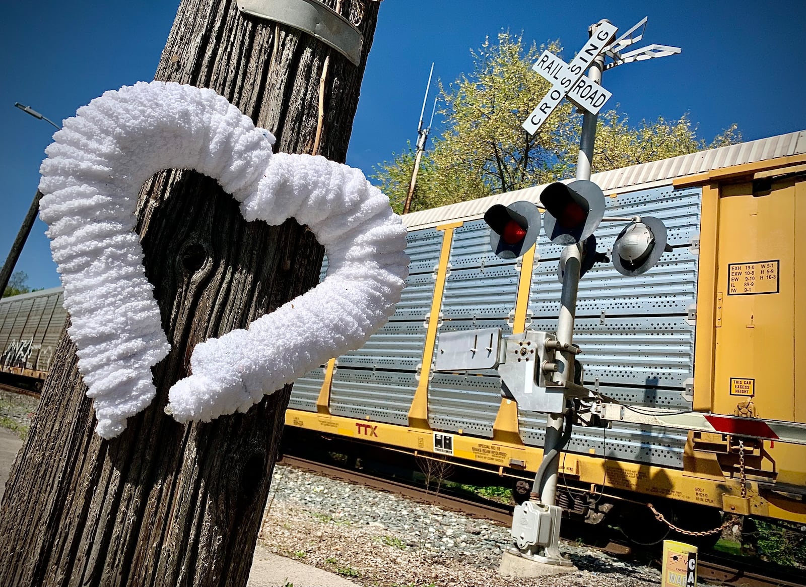 A broken heart memorial marks the railroad crossing at West Walnut Street in Tipp City, where Cynthia Steele, 47, was struck and killed by a CSX train April 8, 2024. MARSHALL GORBY\STAFF