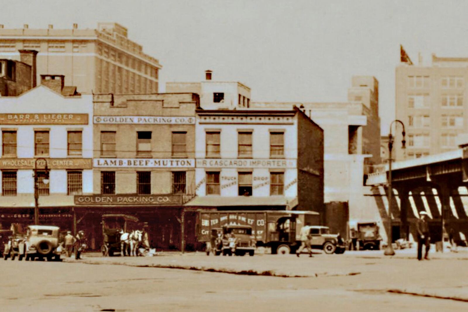 This image from the Collections of the New York Public Library shows part of New York's Meatpacking District, and the construction of the High Line Railway, right. (Collections of the New York Public Library via AP)