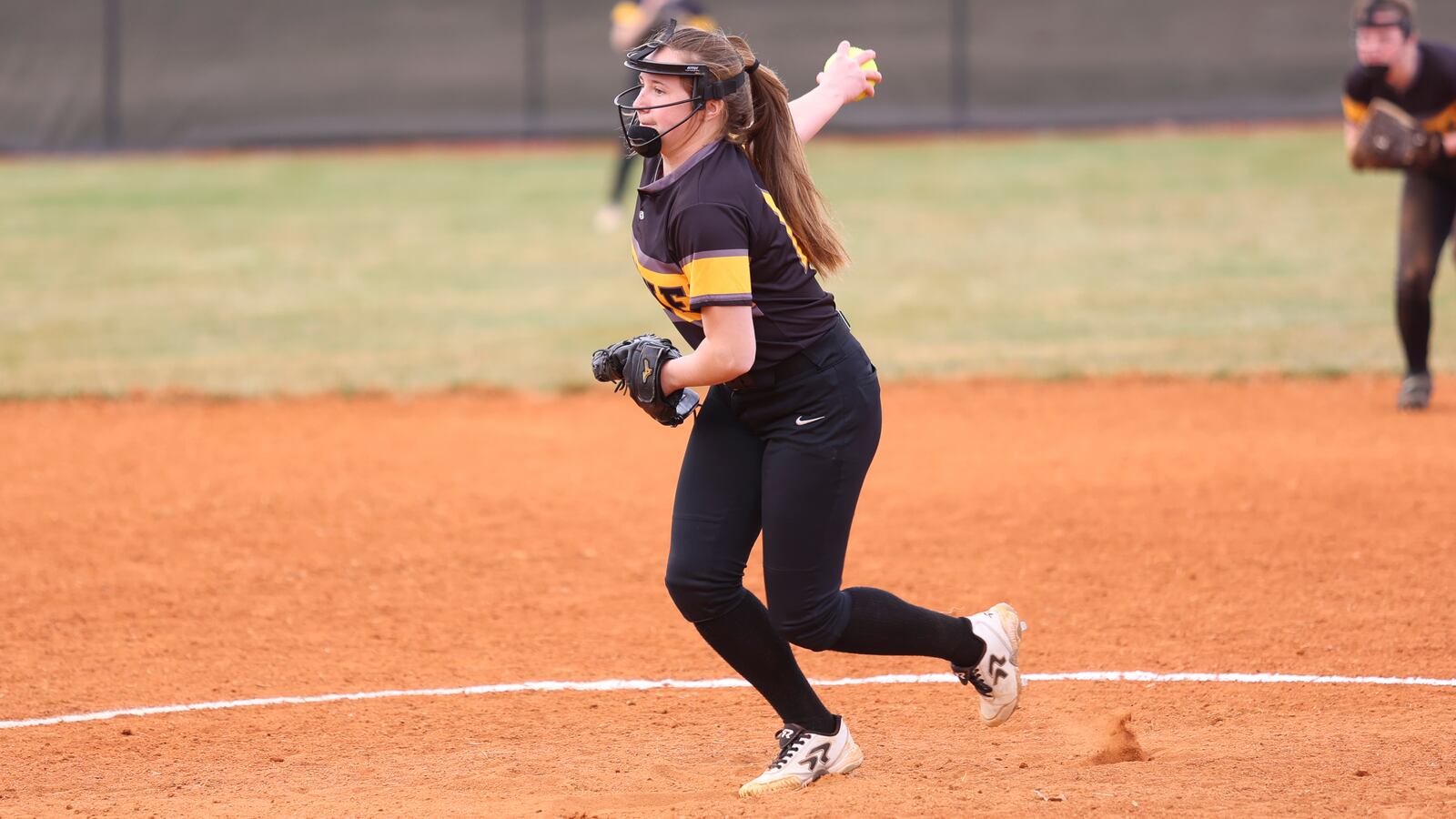 Shawnee High School senior Hannah Beers pitches during a recent scrimmage game against Sidney on March 22 in Springfield. Michael Cooper/CONTRIBUTED