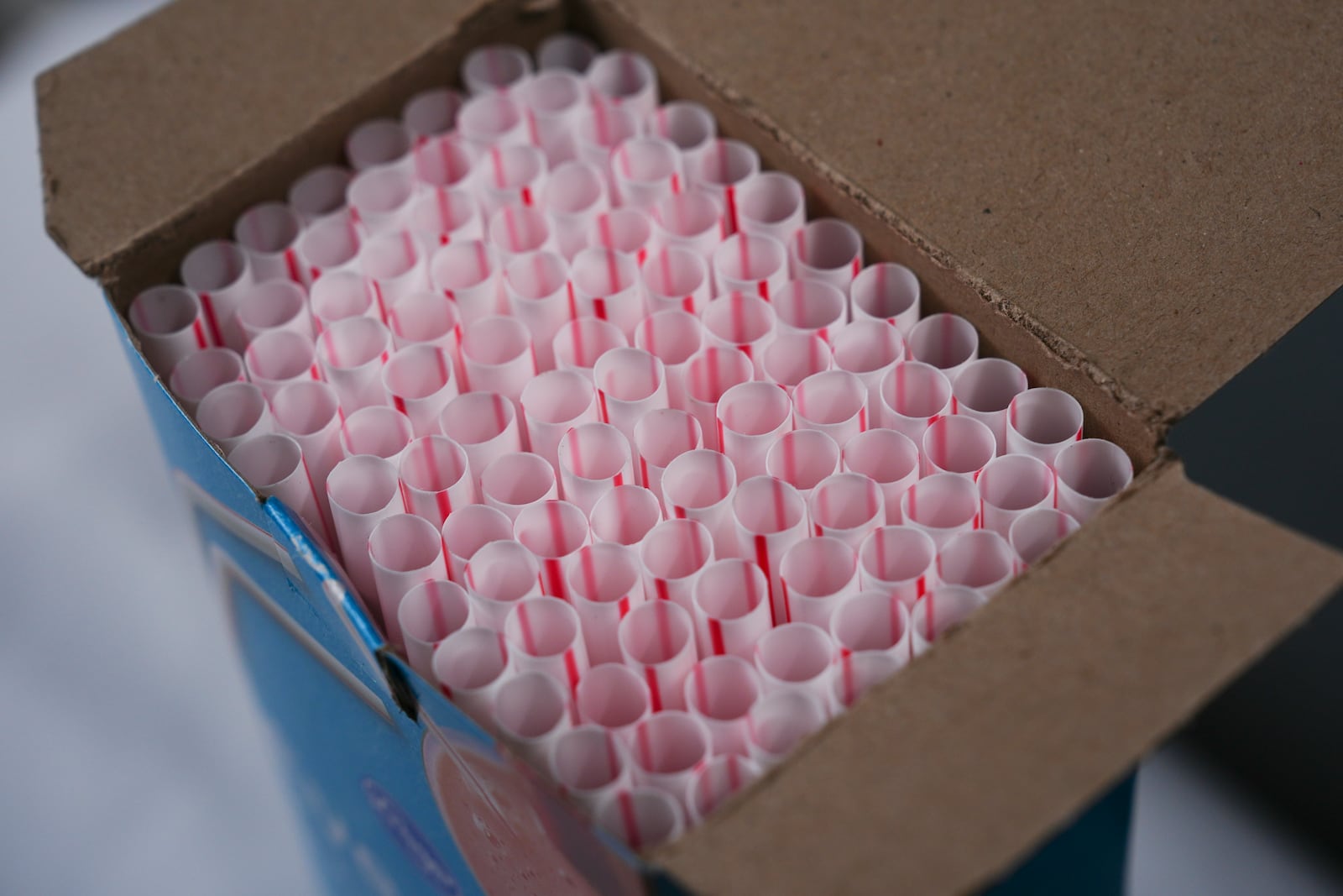 A box of plastic straws is displayed, Tuesday, Feb. 11, 2025, in Cincinnati. (AP Photo/Joshua A. Bickel)