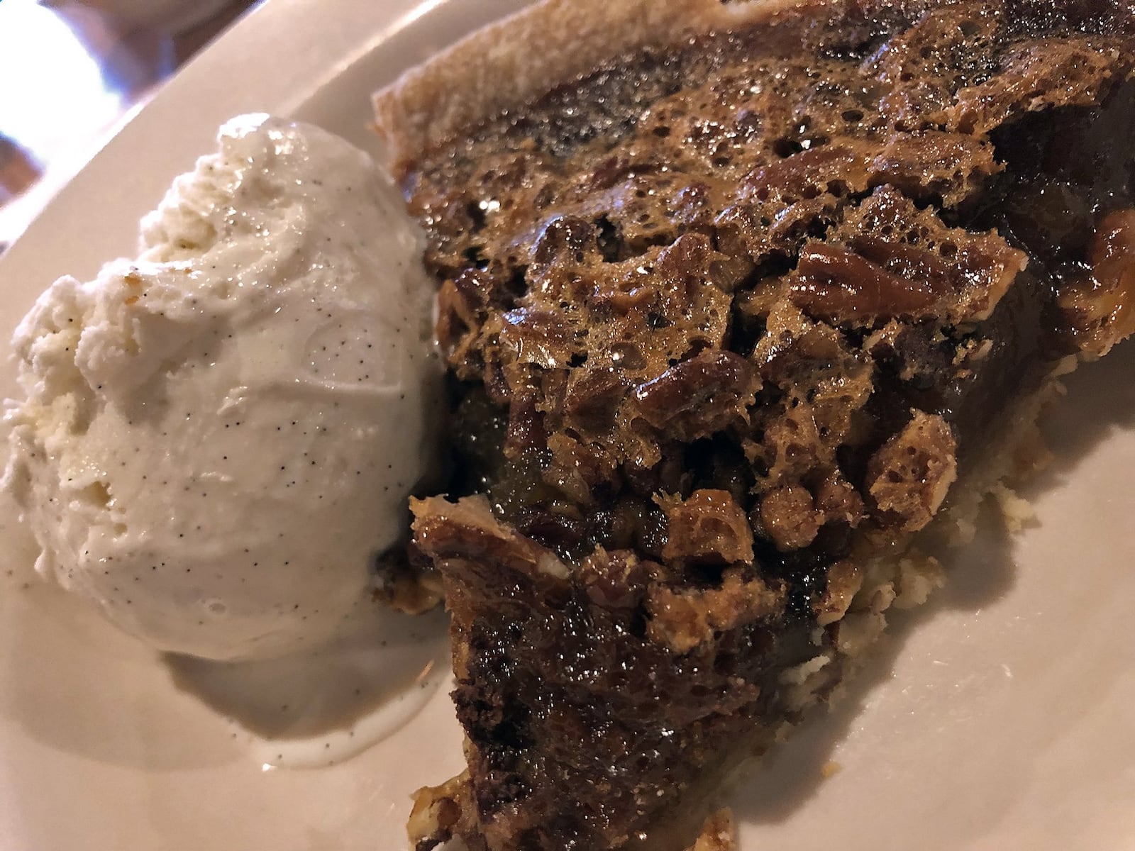 Warm pecan pie with ice cream for dessert at Cracker Barrel. BILL LACKEY/STAFF