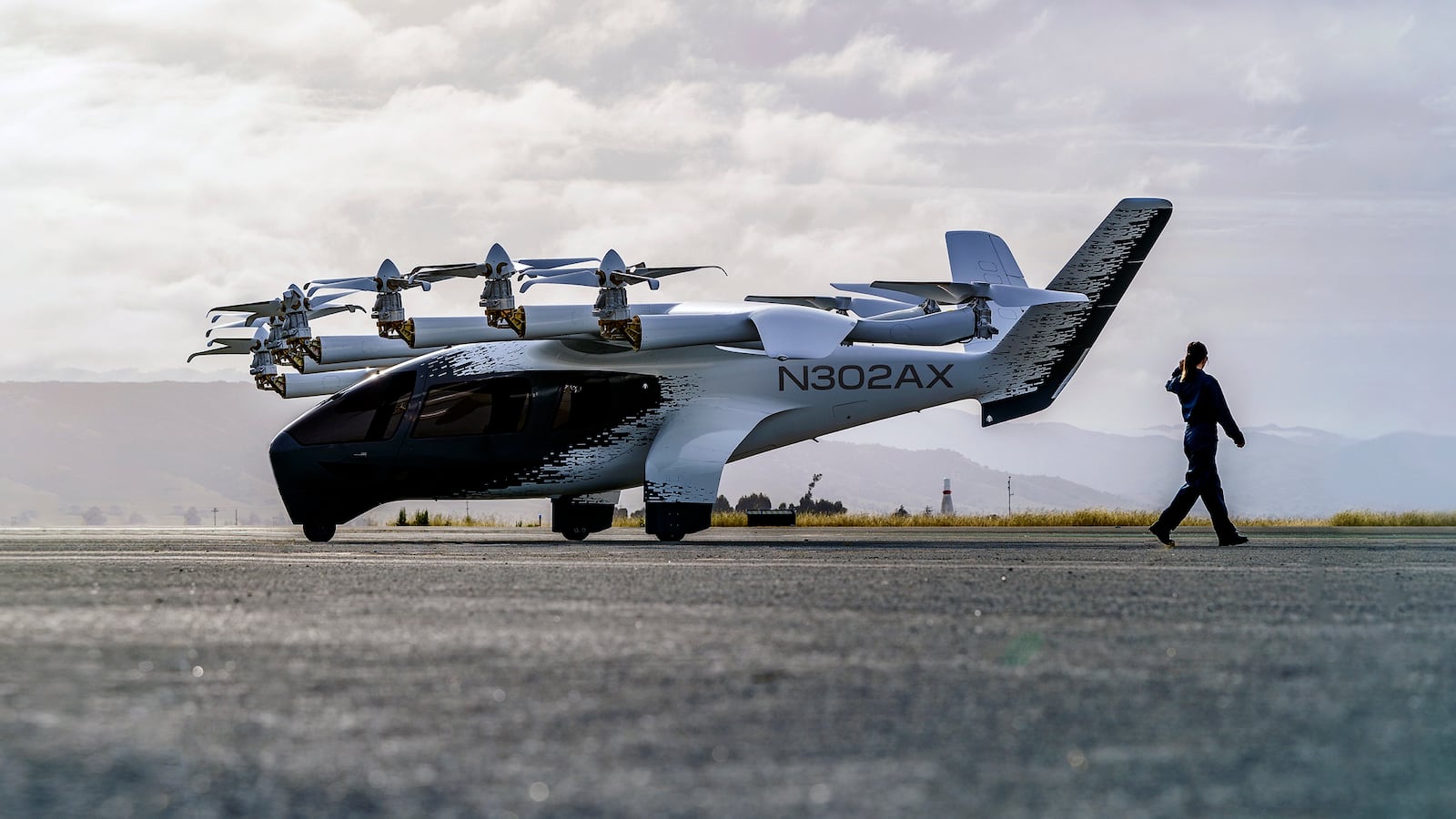 An "electric vertical take-off and landing" aircraft built by Archer Aviation is parked at an airfield in Salinas, Calif. in 2024. (Archer Aviation via AP)