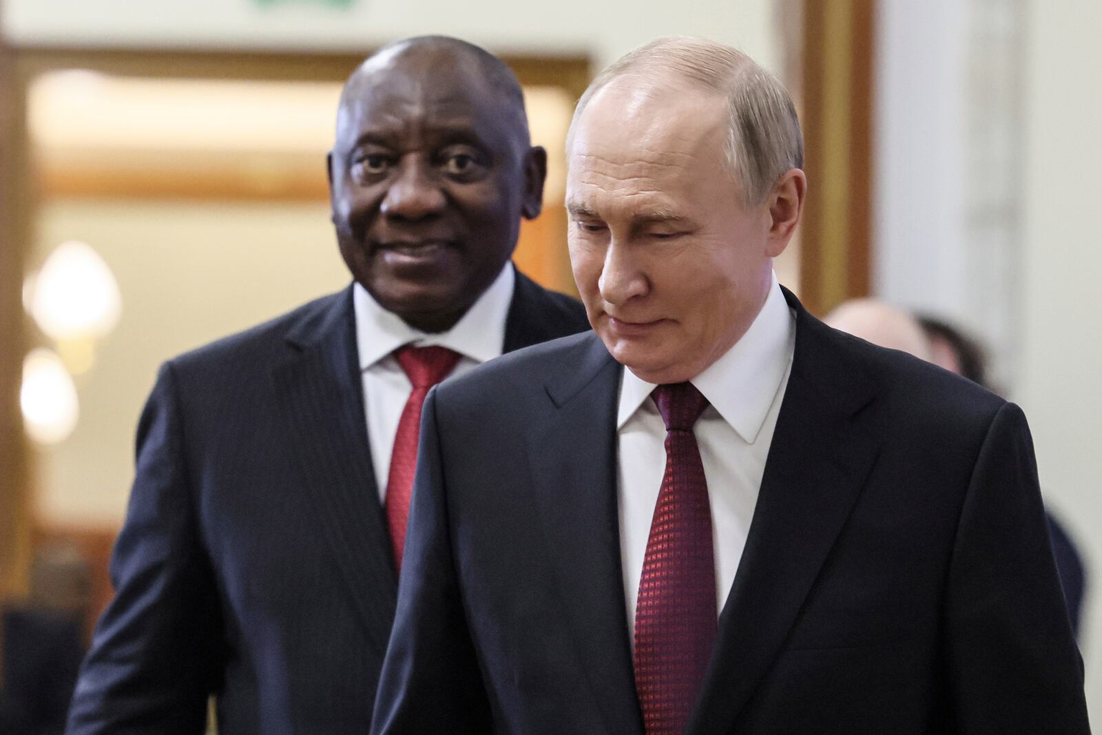 Russian President Vladimir Putin walks with South African President Cyril Ramaphosa on the sidelines of BRICS Summit at Kazan Kremlin in Kazan, Russia, Tuesday, Oct. 22, 2024. (Mikhail Metzel, Sputnik, Kremlin Pool Photo via AP)