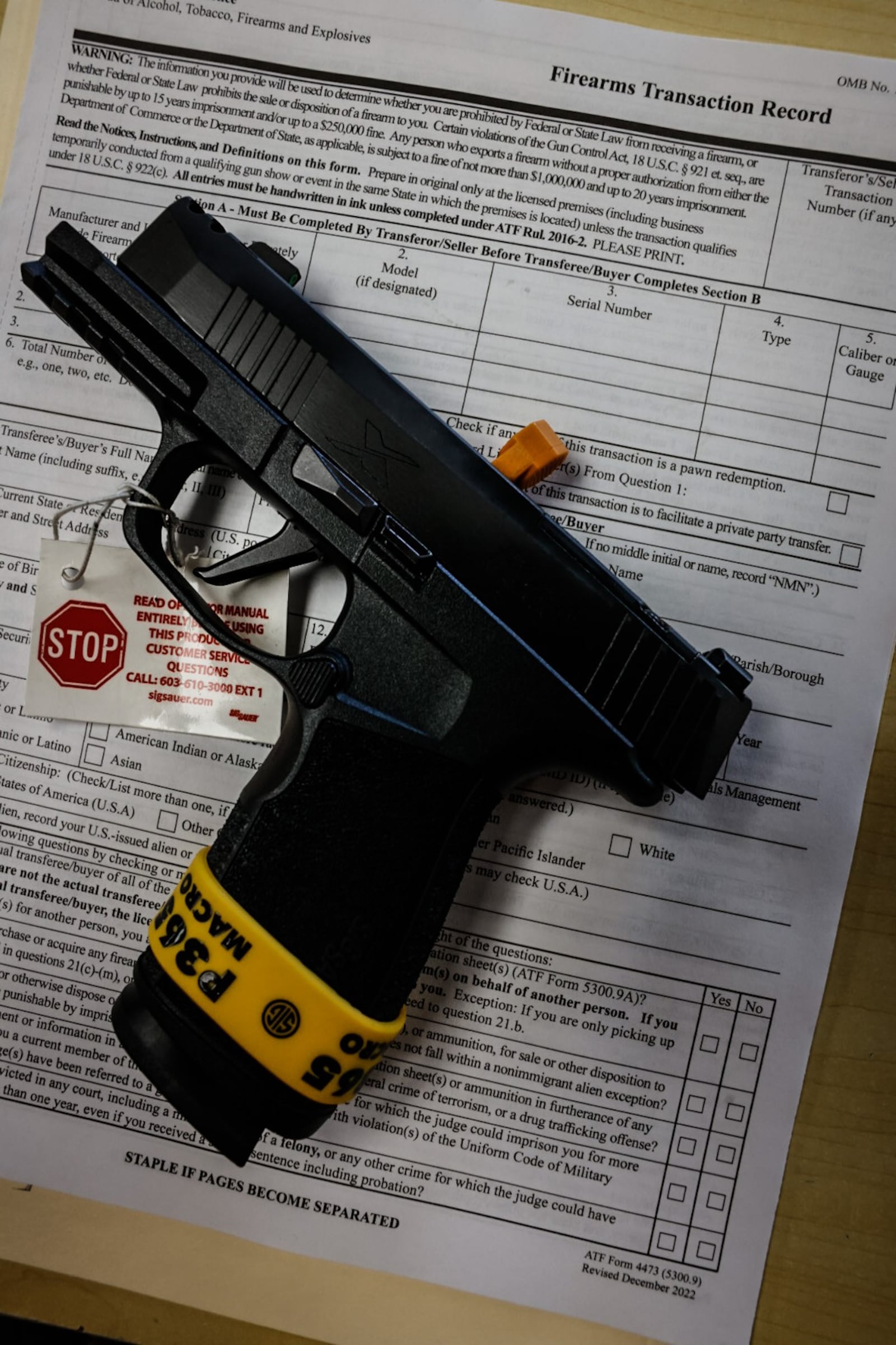 This is a firearm transaction record that is filled out prior to any gun sale at Miami Armory. JIM NOELKER/STAFF