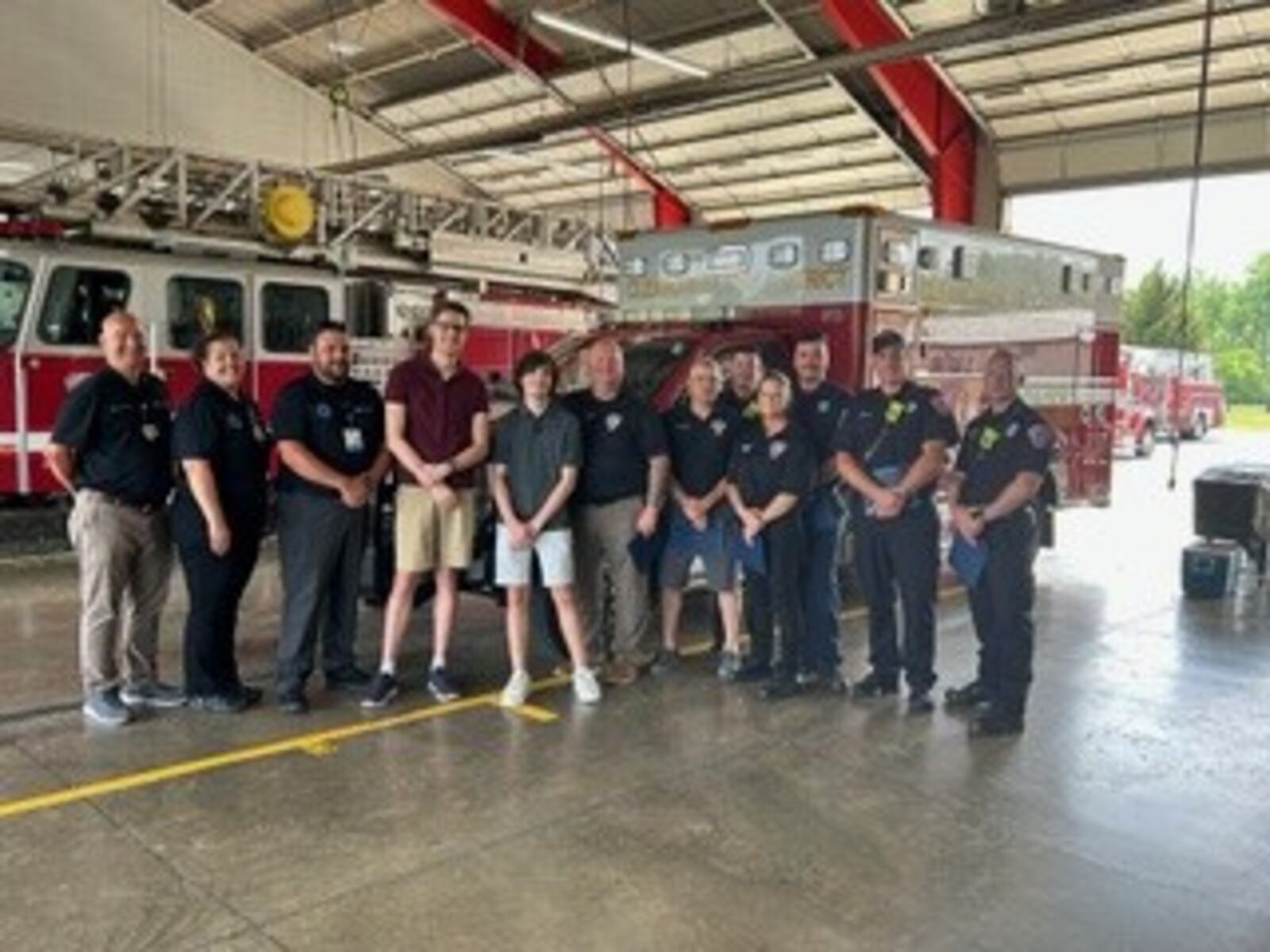 In January, Aiden Williamson, 16, a junior at Warren County Career Center, suffered a cardiac arrest while in school. He credits several medical personnel for saving his life. On Friday, Aiden presented Challenge Coins during a ceremony at Clearcreek Twp. Fire Station 21. RICK McCRABB/CONTRIBUTED