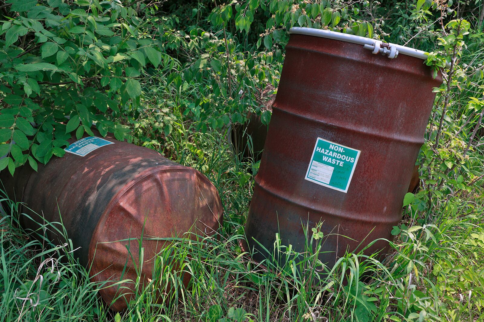 Empty barrels, used for testing years ago, remain at the Tremont City Barrel Fill Wednesday, June 7, 2023. BILL LACKEY/STAFF