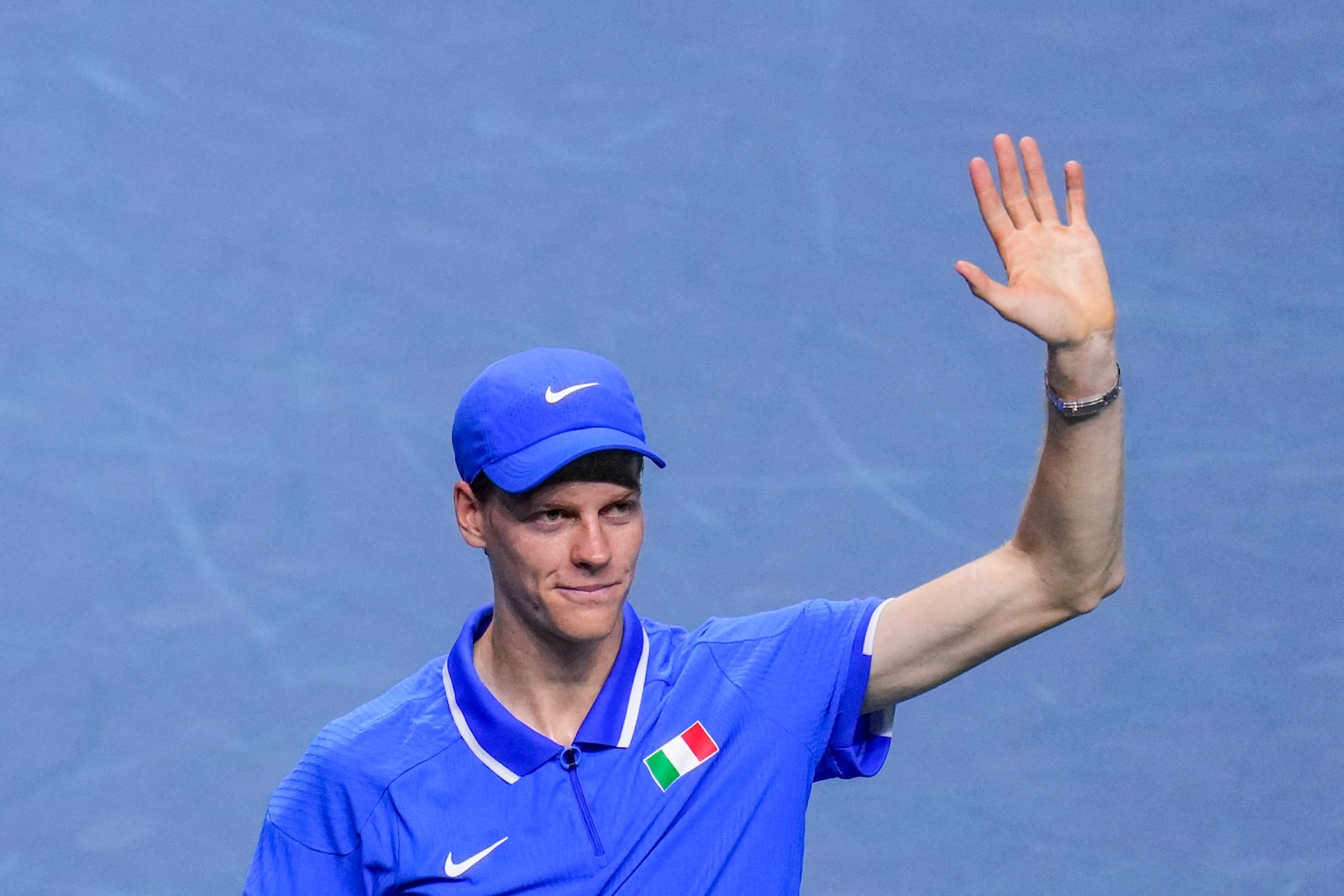 Italy's Jannik Sinner celebrates after winning against Australia's Alex de Minaur during the Davis Cup semifinal at the Martin Carpena Sports Hall in Malaga, southern Spain, on Saturday, Nov. 23, 2024. (AP Photo/Manu Fernandez)