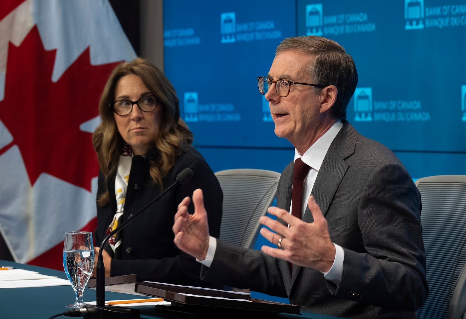 Bank of Canada Senior Deputy Governor Carolyn Wilkins looks on as Governor Tiff Macklem speaks during a news, Wednesday, Dec. 11, 2024 in Ottawa, Ontario. (Adrian Wyld/The Canadian Press via AP)