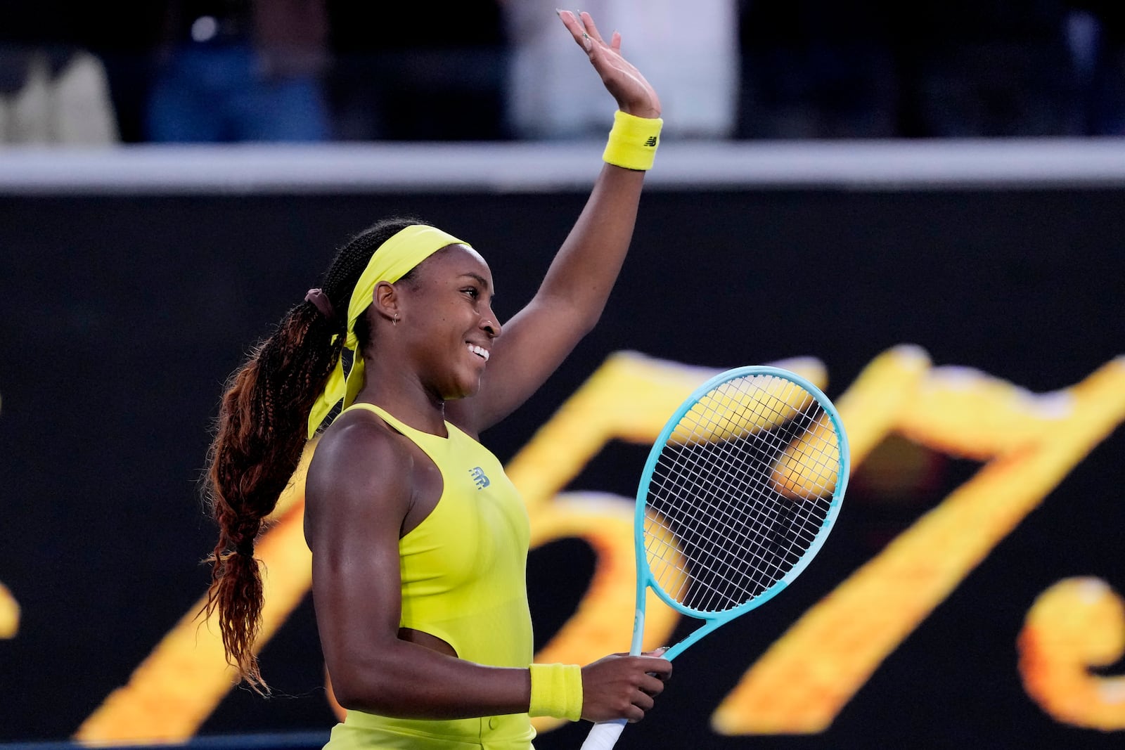 Coco Gauff of the U.S. waves after defeating Leylah Fernandez of Canada in their third round match at the Australian Open tennis championship in Melbourne, Australia, Friday, Jan. 17, 2025. (AP Photo/Vincent Thian)