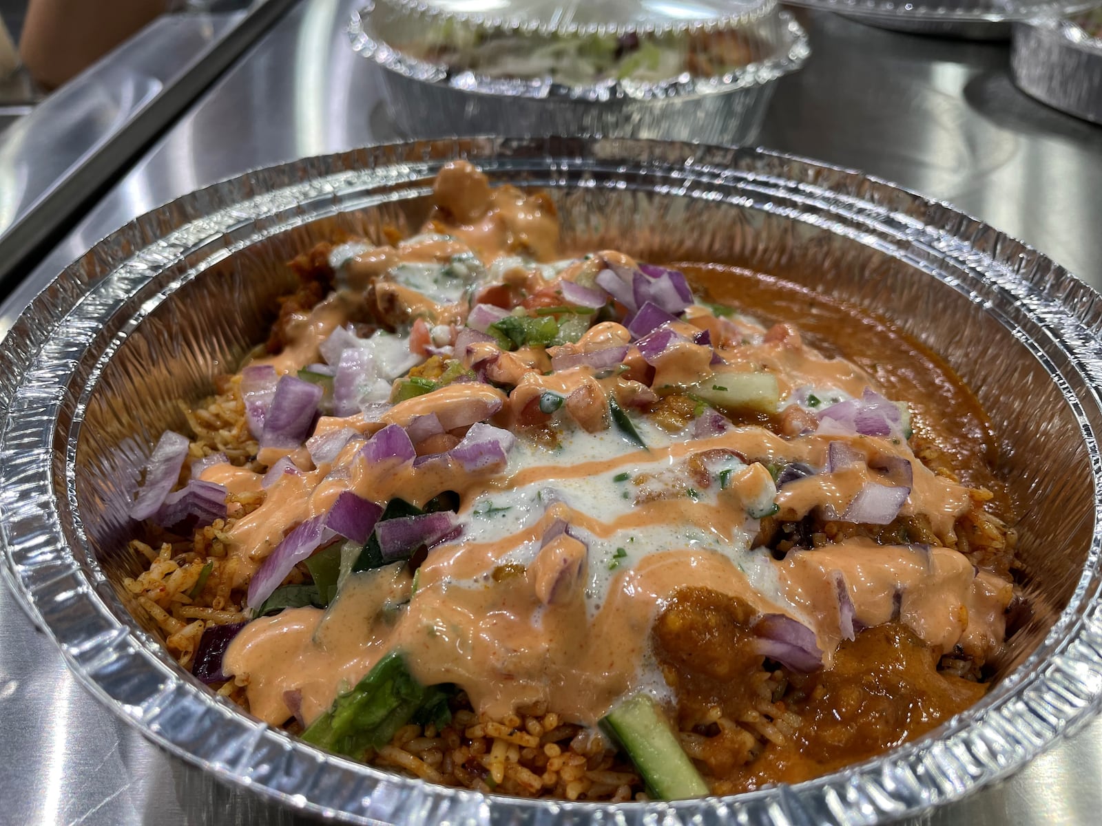 The Twist Indian Grill, a new fast-casual Indian restaurant where customers can create their own bowls and burritos, is holding a grand opening Thursday, Oct. 20 at 2627 S. Smithville Road (CONTRIBUTED PHOTO).