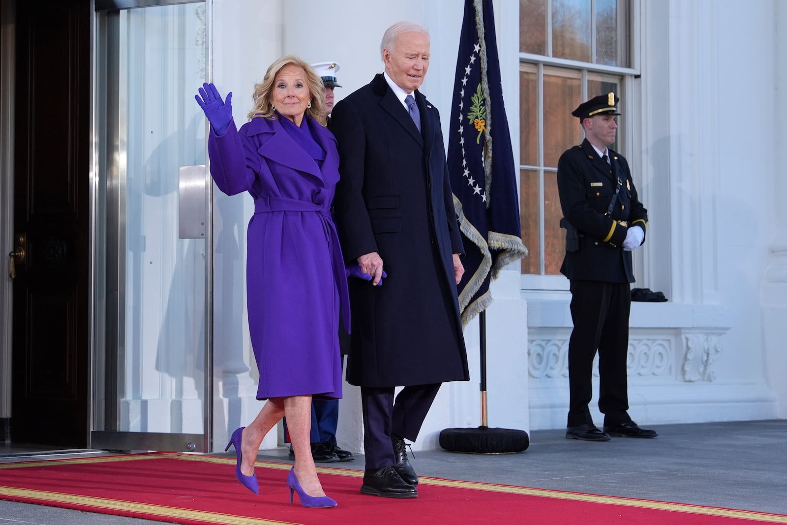 President Joe Biden, right, and first lady Jill Biden walk to greet President-elect Donald Trump and Melania Trump upon arriving at the White House, Monday, Jan. 20, 2025, in Washington. (AP Photo/Evan Vucci)