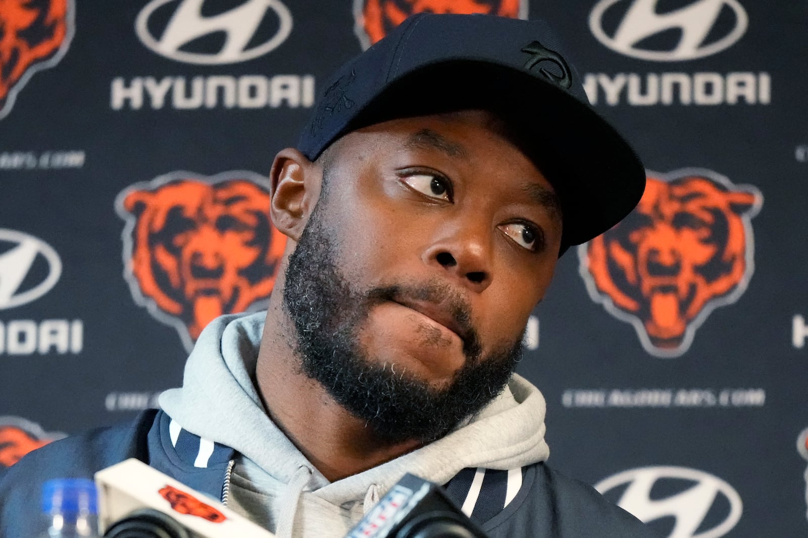 Chicago Bears interim head coach Thomas Brown listens to reporters after an NFL football game against the Seattle Seahawks, Thursday, Dec. 26, 2024, in Chicago. (AP Photo/Nam Y. Huh)