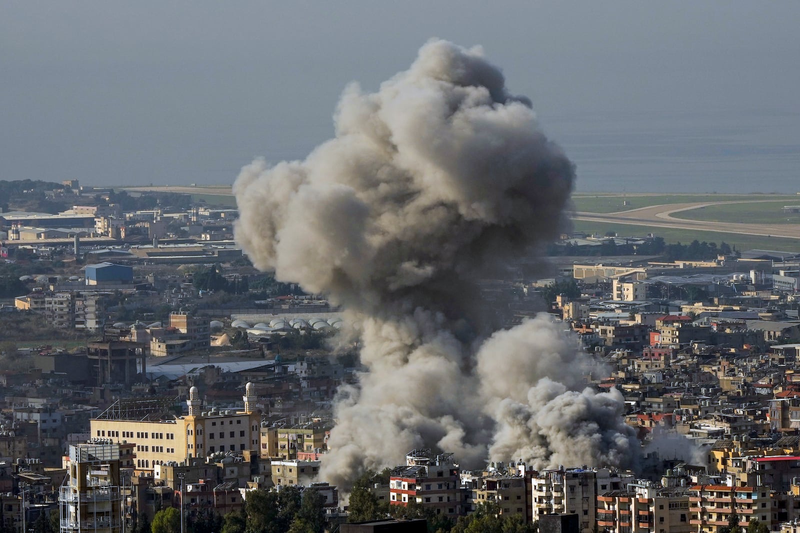 Smoke rises after an Israeli airstrike on Dahiyeh, in the southern suburb of Beirut, Lebanon, Saturday, Nov. 23, 2024. (AP Photo/Hassan Ammar)