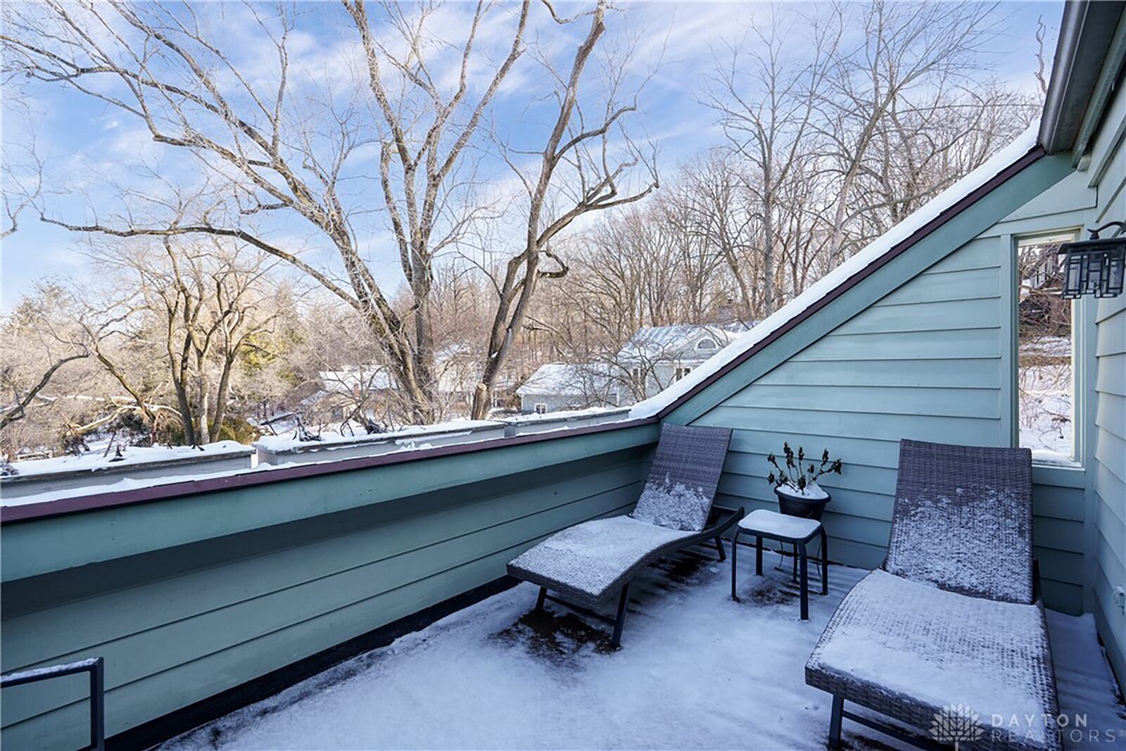 The third level has a private balcony over the garage.