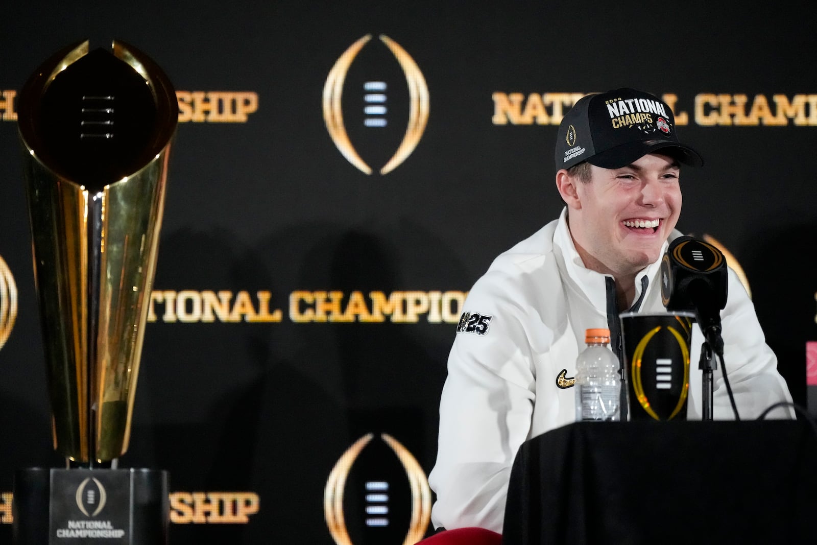 Ohio State quarterback Will Howard smiles during the winners news conference after the College Football Playoff national championship game against Notre Dame Tuesday, Jan. 21, 2025, in Atlanta.(AP Photo/Chris Carlson)