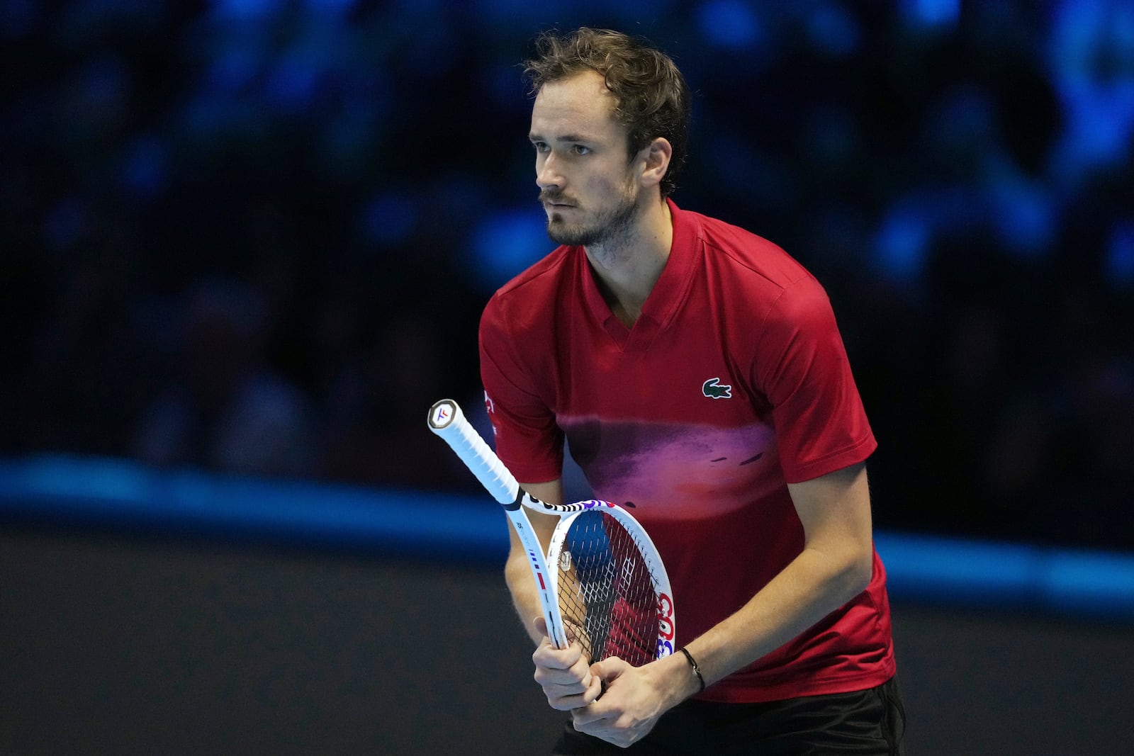 Russia's Daniil Medvedev reacts during the singles tennis match of the ATP World Tour Finals against United States' Taylor Fritz, at the Inalpi Arena, in Turin, Italy, Sunday, Nov. 10, 2024. (AP Photo/Antonio Calanni)