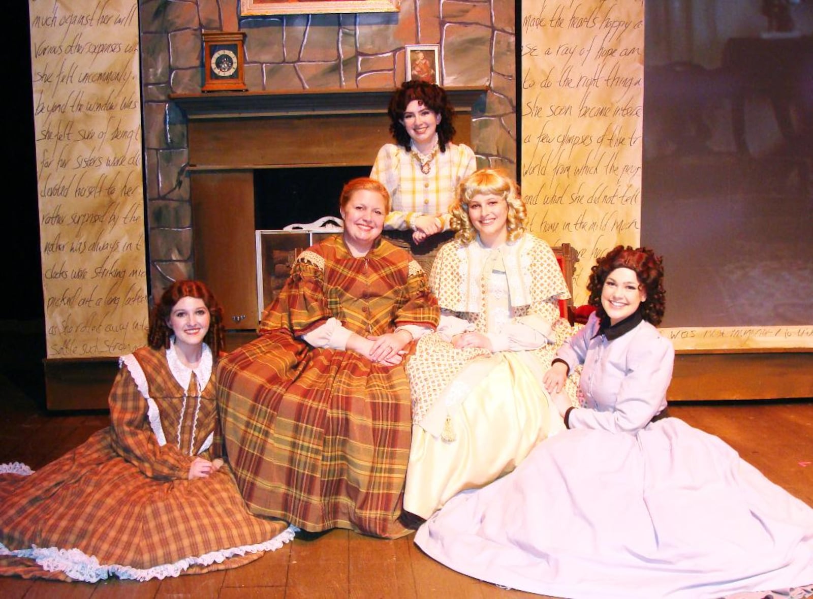 Left to right: Allison Gabert (Beth March), Angela Allen (Marmee), Catie Cummings (Meg March), Gracie Adkins (Amy March) and Kayla Stroud (Jo March) in La Comedia Dinner Theatre's production of "Little Women: The Musical." PHOTO BY JUSTIN WALTON