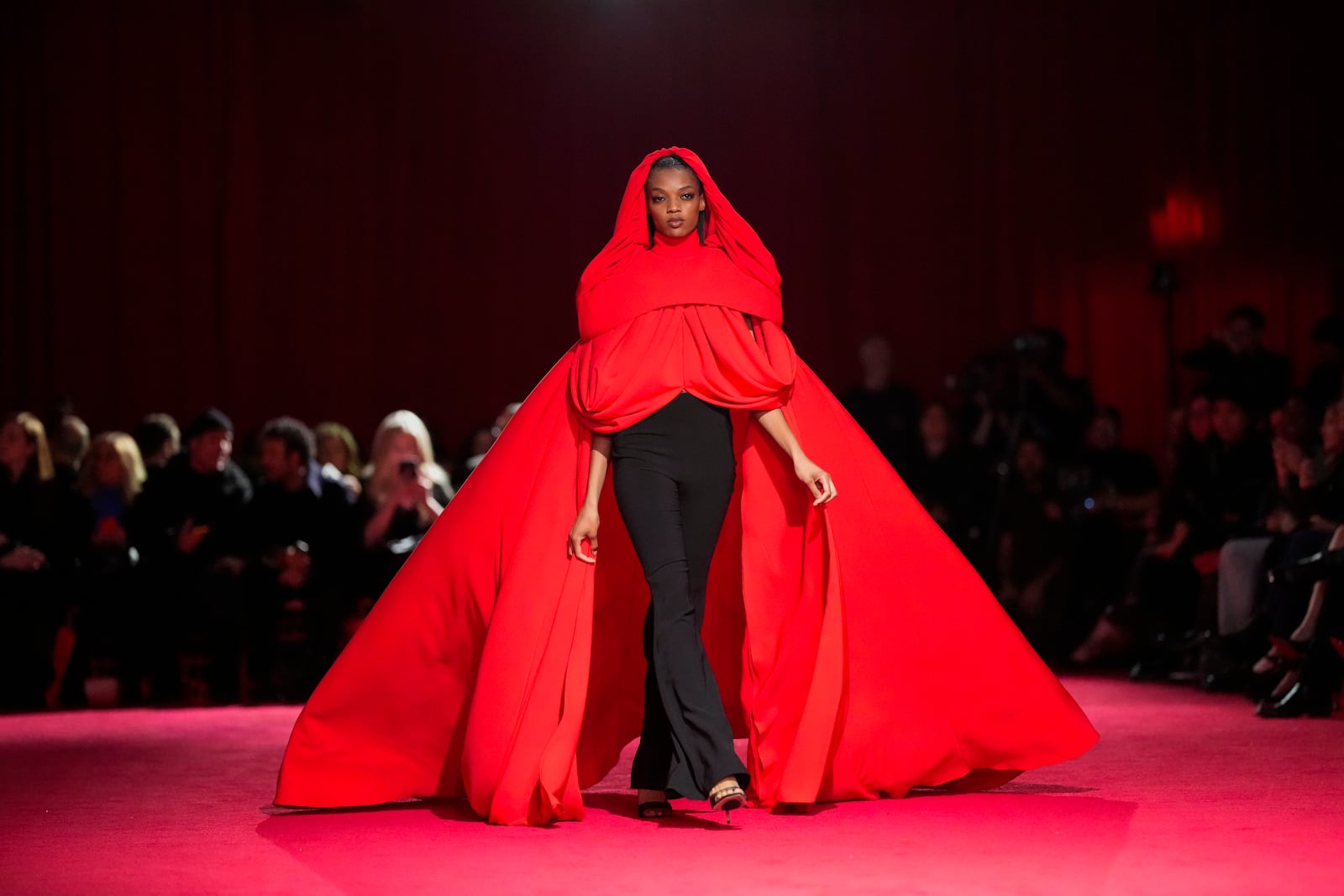 A model walks the runway during the Christian Siriano Fall/Winter 2025 fashion show at Chelsea Industrial during New York Fashion Week on Thursday, Feb. 6, 2025, in New York. (Photo by Charles Sykes/Invision/AP)