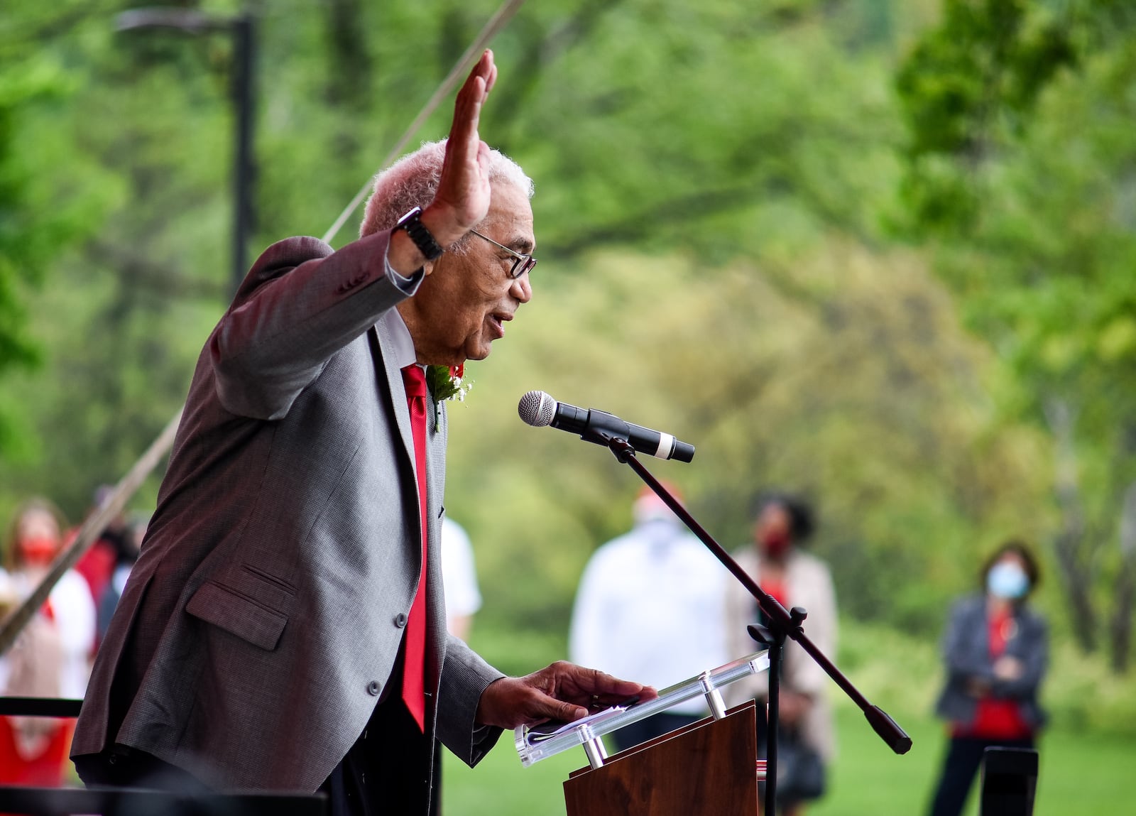 Wayne Embry speaks to a crowd during a ceremony and presentation of the Freedom Summer of '64 Award and unveiling of a statue in his honor Tuesday, May 18, 2021 at Miami University in Oxford. Wayne Embry and his late wife Theresa Embry, both Miami alumni, were awarded the Freedom of Summer of '64 Award for their life's work as civil right champions and mentors. A statue of Wayne Embry in a basketball pose, created by sculptor Tom Tsuchiya, was unveiled in front of Millett Hall and a scholarship in his name was announced to support Miami varsity men's basketball student athletes. NICK GRAHAM / STAFF