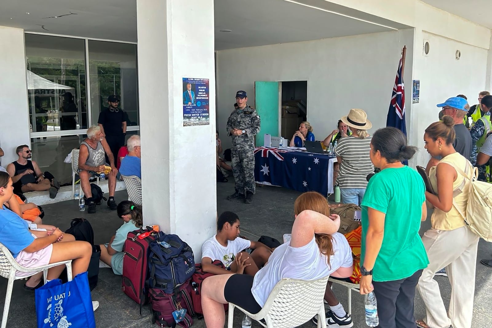 Australian citizen's are briefed on evacuation plans in Port Vila, Thursday, Dec. 19, 2024, following a magnitude 7.3 earthquake that struck off the coast of Vanuatu in the South Pacific Ocean, Tuesday, Dec. 17. (DFAT via AP)