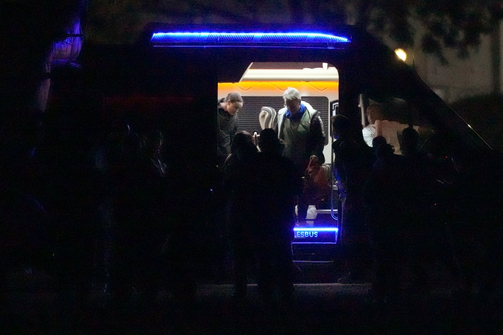 Israeli Emily Damari, who was kidnapped in Gaza by Hamas on Oct. 7, steps out of a van before boarding a helicopter after being released from Gaza, southern Israel, Sunday, Jan. 19, 2025. (Photo/Ohad Zwigenberg)